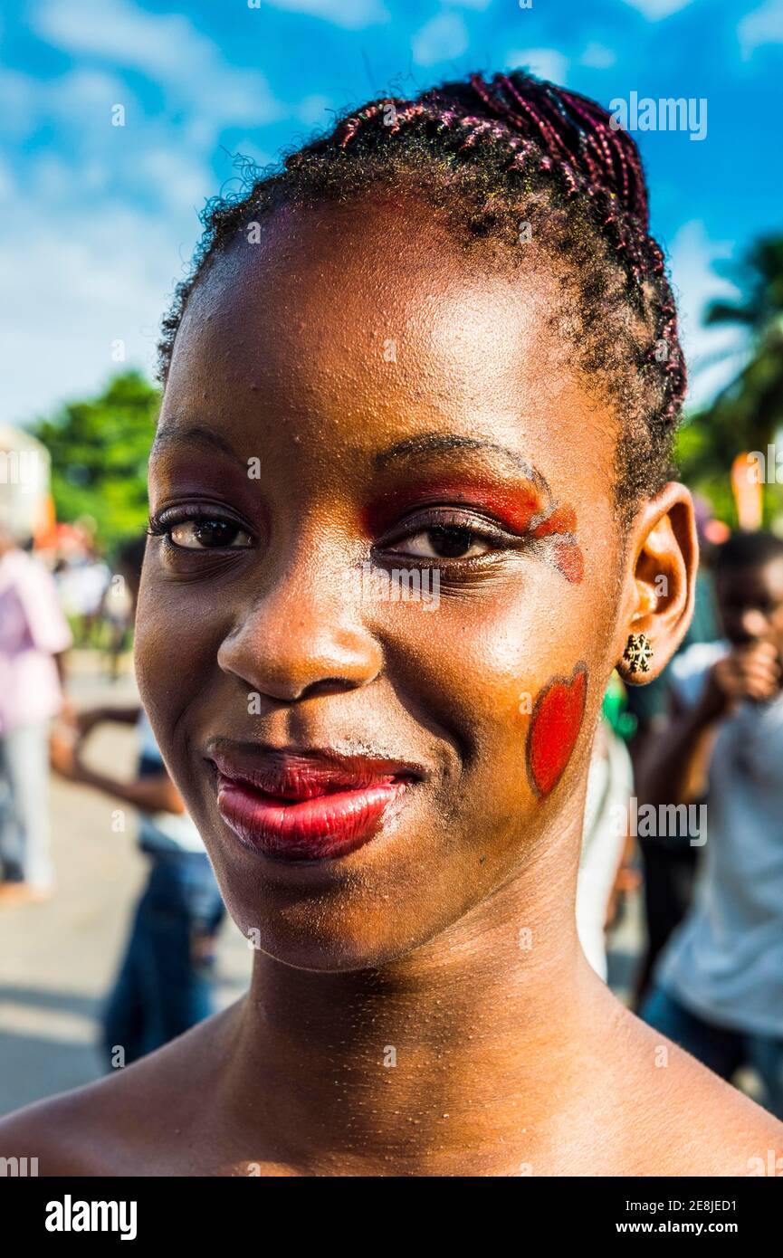 Girl posing at the Carneval in the town of Sao Tome, Sao Tome and