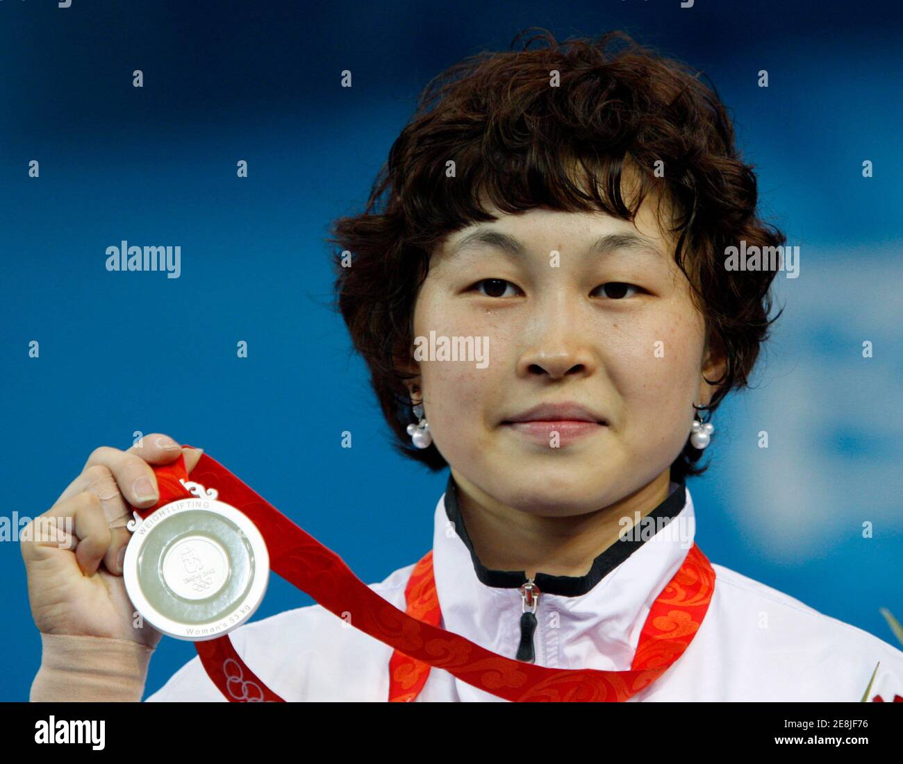 Yoon Jinhee of South Korea poses with her silver medal in the women's 53kg weightlifting competition at the Beijing 2008 Olympic Games August 10, 2008.     REUTERS/Oleg Popov (CHINA) Stock Photo