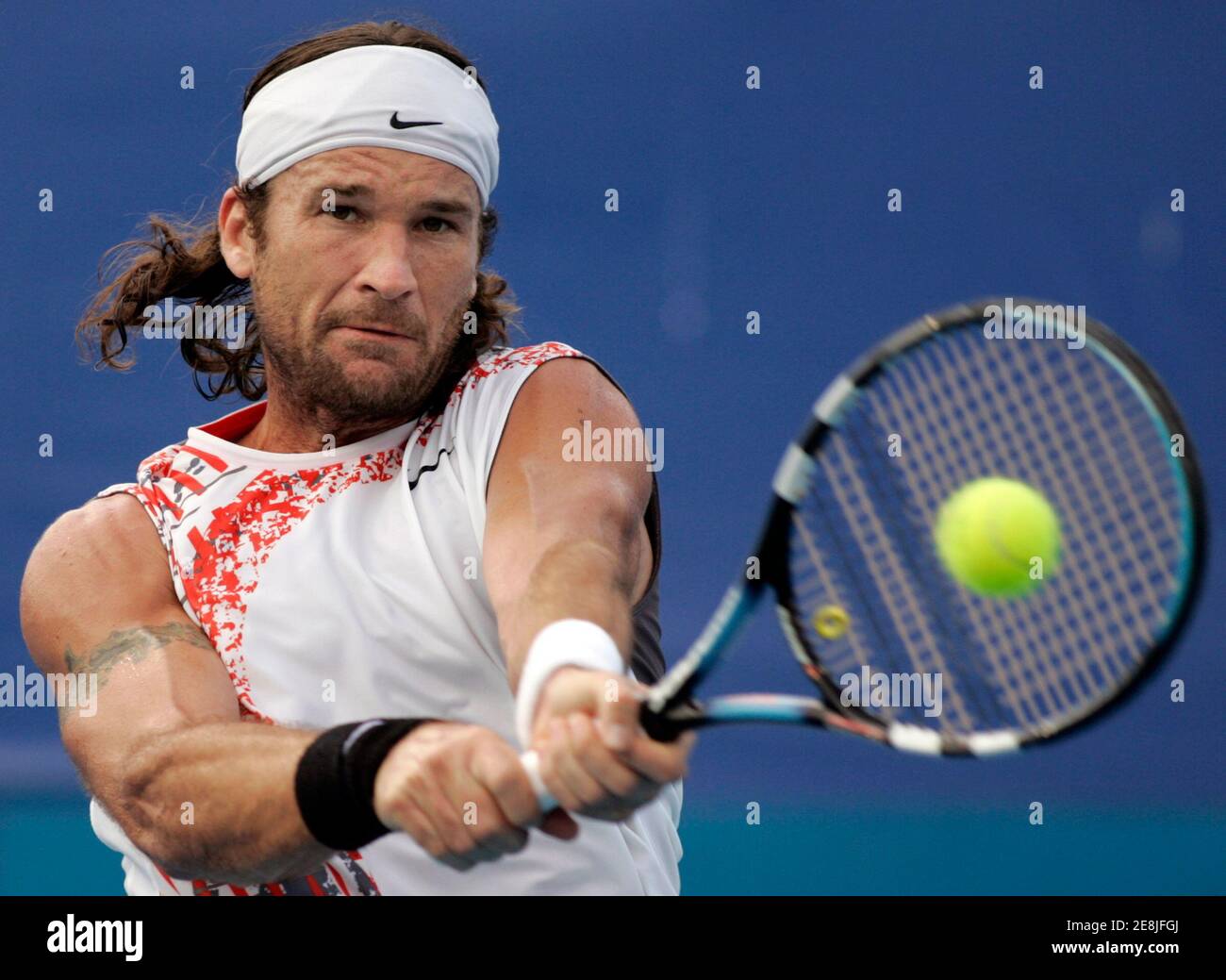 Fifth seed Carlos Moya of Spain hits a backhand during his win over Austria's Stefan Koubek at the Sydney International tennis tournament January 8, 2008. REUTERS/Will Burgess     (AUSTRALIA) Stock Photo