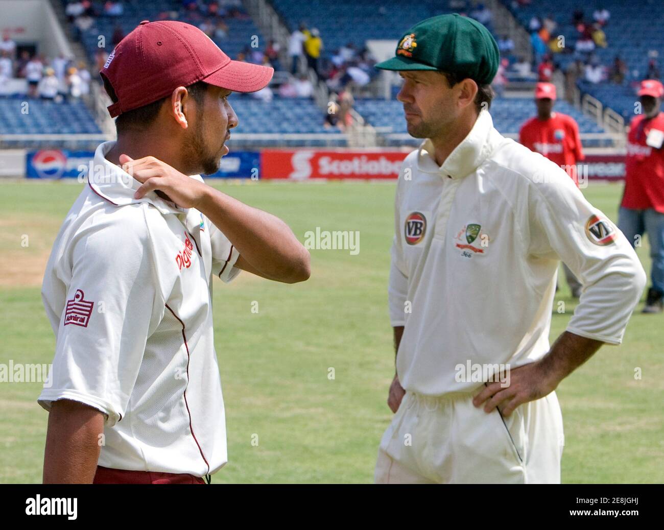 West Indies captain Ramnaresh Sarwan (L) walks past Australia's captain Ricky Ponting following the final day of their first cricket test match in Kingston, Jamaica May 26, 2008. Australia won the match.    REUTERS/Andy Clark     (JAMAICA) Stock Photo