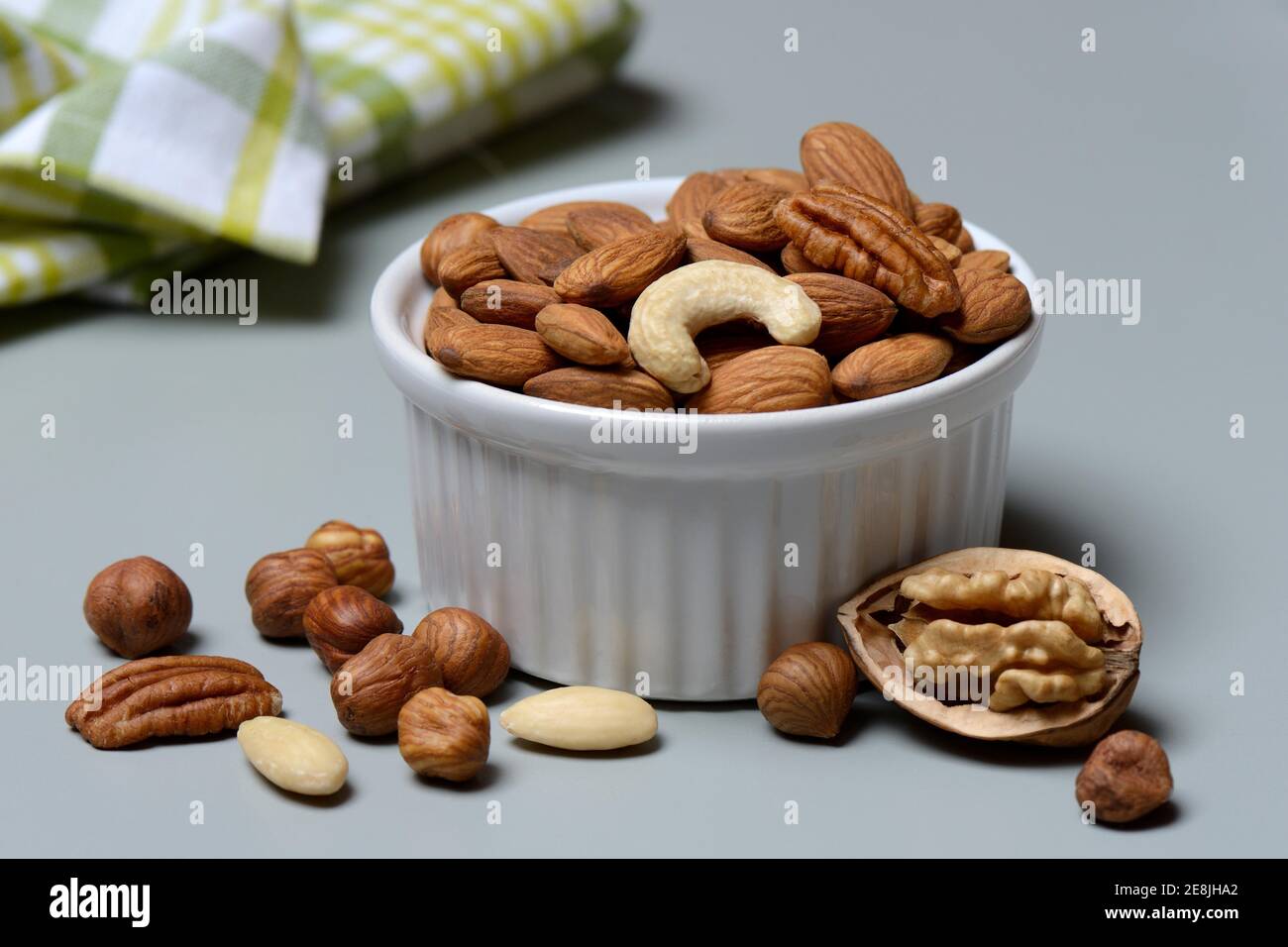 Mixed nuts in shell, nut mix, nut mixture, walnut, pecan, hazelnut, hazelnuts, cashew nuts, almonds Stock Photo