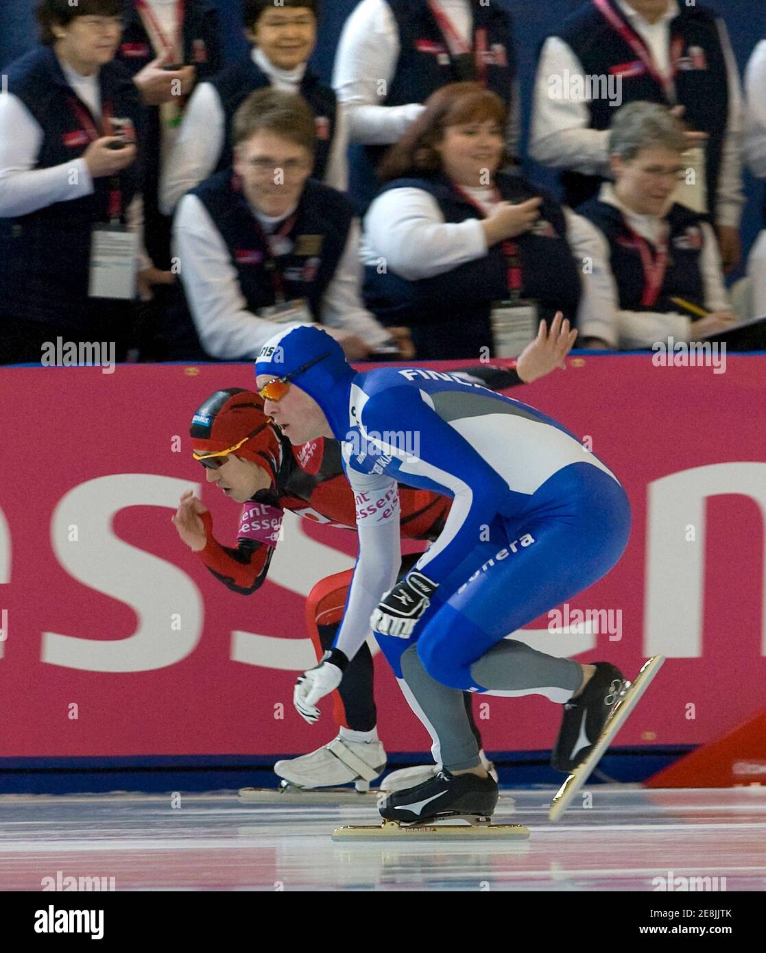 Japan's Keiichiro Nagashima (L) and Finland's Mika Poutala race head to head in the men's 500-metre during the World Cup Single Distance Speed Skating Championships in Richmond, British Columbia March 15, 2009.       REUTERS/Andy Clark     (CANADA SPORT SPEED SKATING) Stock Photo