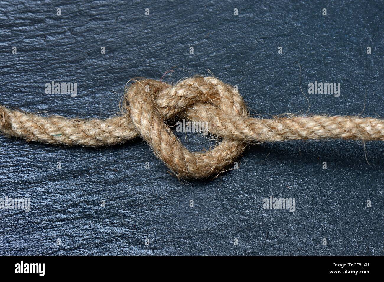Knots in jute rope, intertwined, knotted Stock Photo Alamy