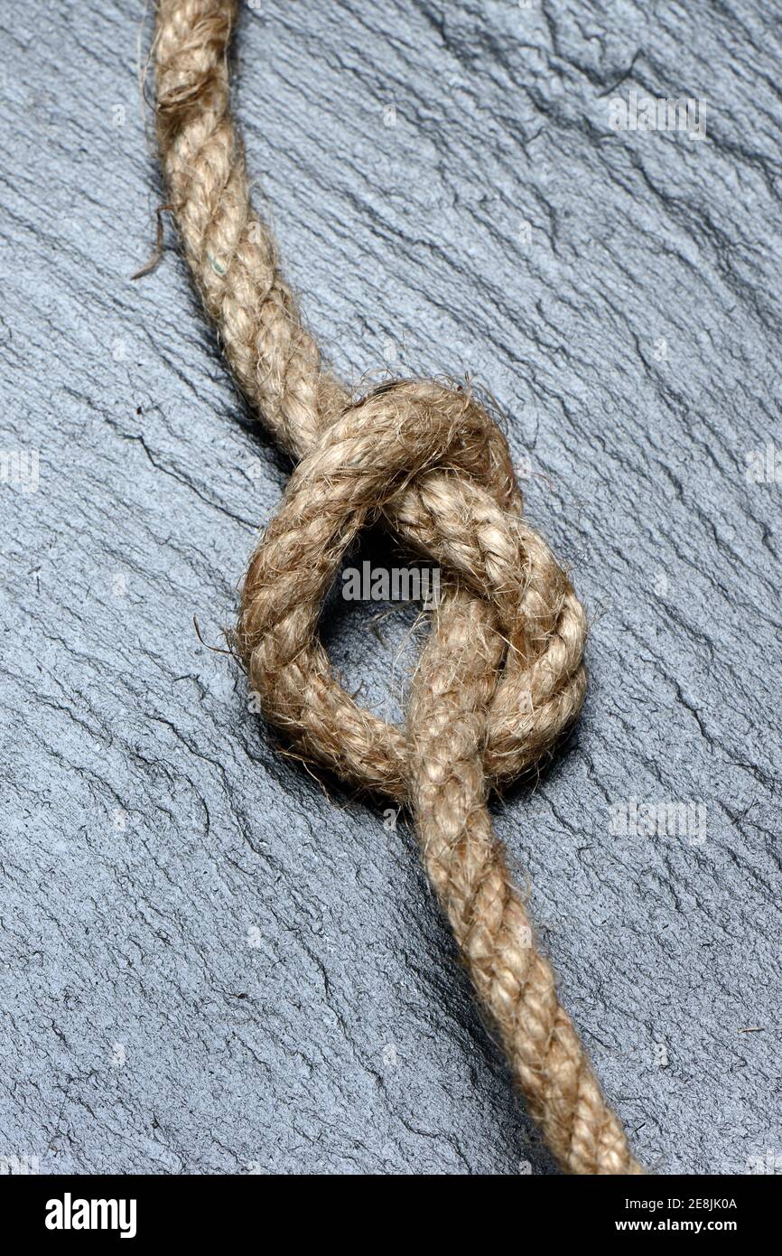 Knots in jute rope, intertwined, knotted Stock Photo Alamy