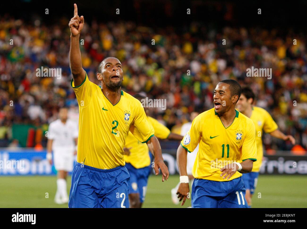Brazil's Maicon (L) celebrates with team mate Robinho after scoring during their Confederations Cup soccer match against the U.S at the Loftus Versfeld Stadium in Pretoria June 18, 2009.       REUTERS/Jerry Lampen (SOUTH AFRICA SPORT SOCCER) Stock Photo
