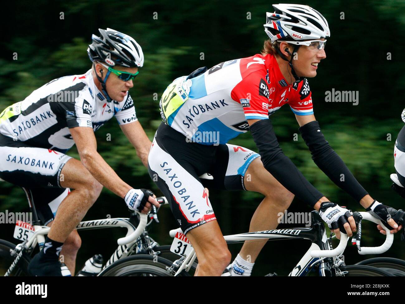 Team Saxo Bank rider Andy Schleck of Luxembourg (R) cycles with Team Saxo  Bank Stuart O'Grady of Australia during the 14th stage of the 96th Tour de  France cycling race between Colmar
