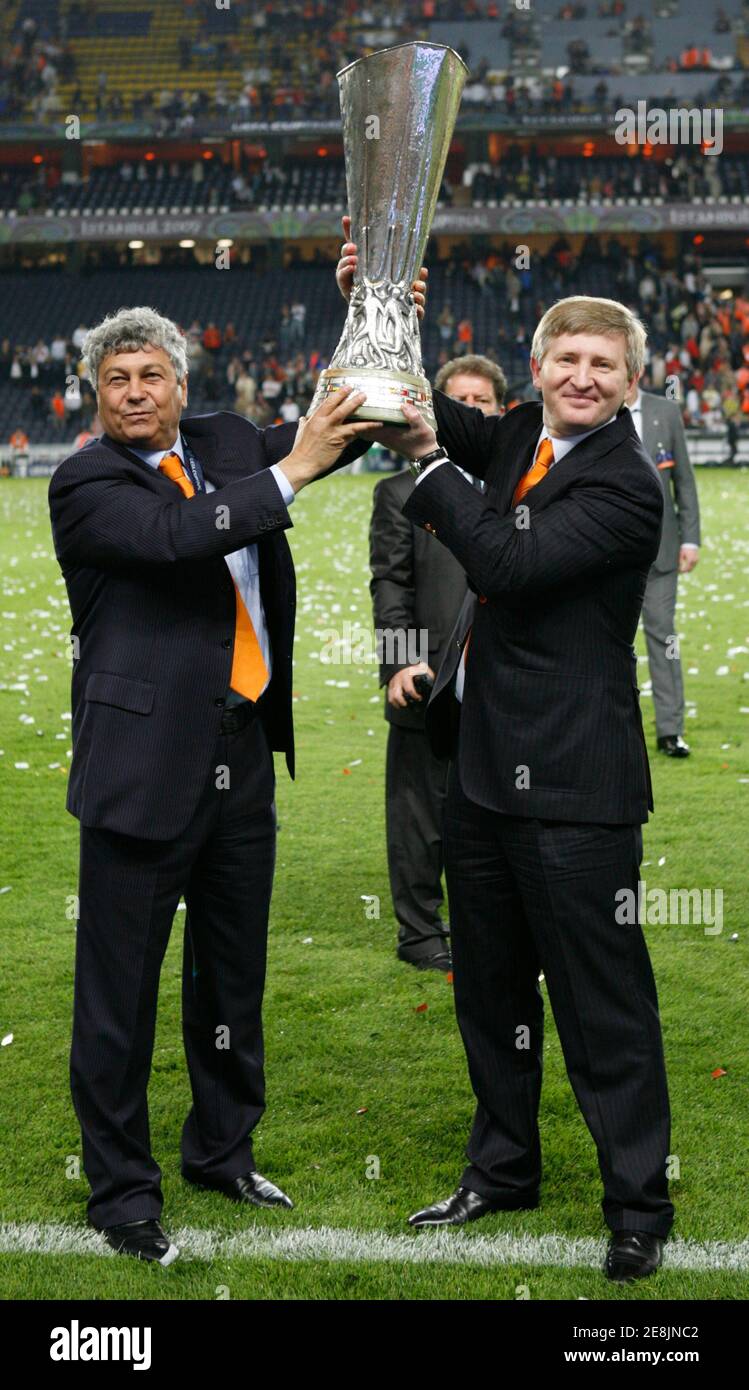 Shakhtar Donetsk S Coach Mircea Lucescu L And Club President Rinat Akhmetov Hold Up The Uefa Cup Trophy After Their Team Defeated Werder Bremen In Final Soccer Match At Sukru Saracoglu Stadium In