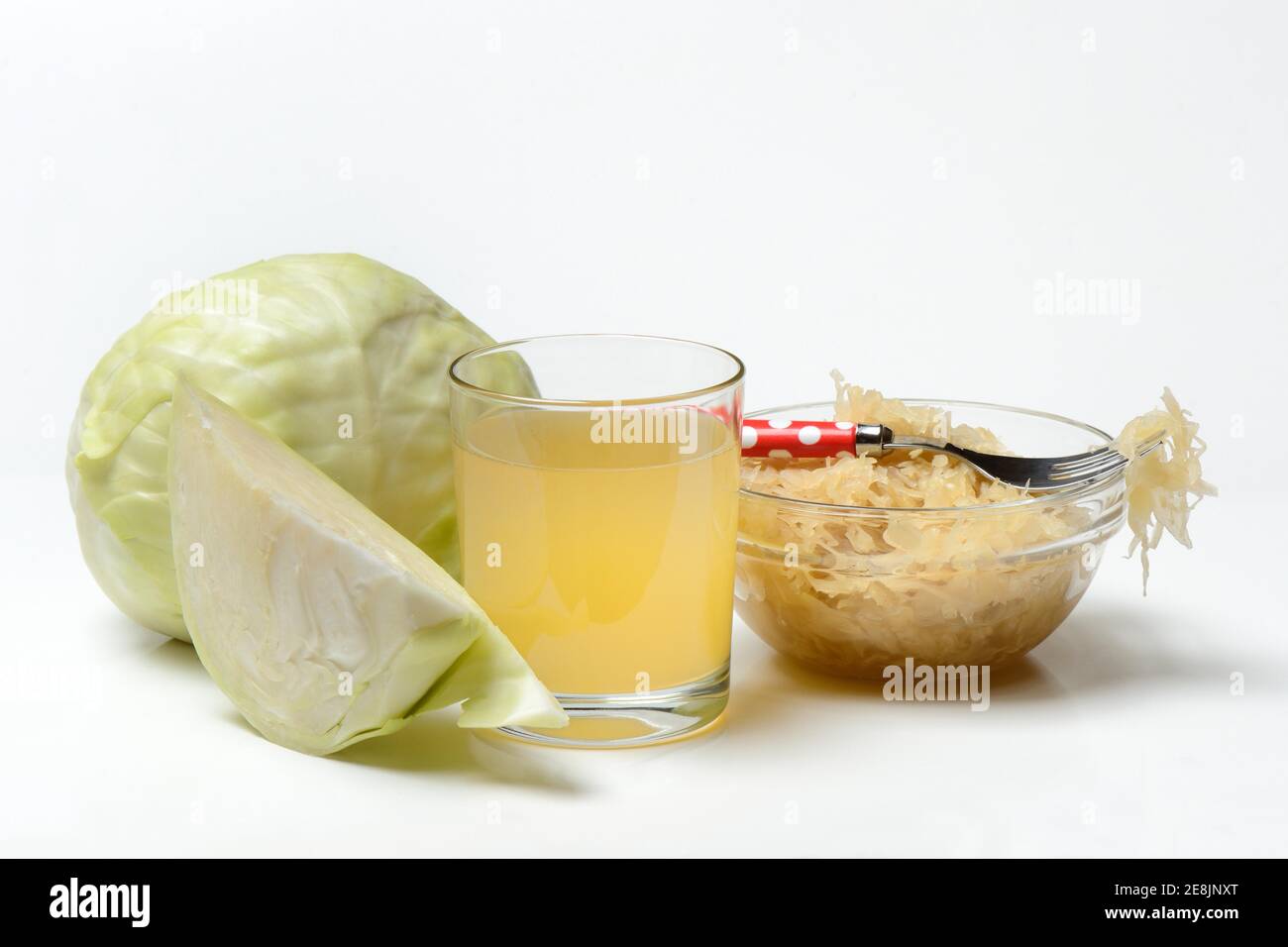Sauerkraut and sauerkraut juice in glass, white cabbage Stock Photo Alamy