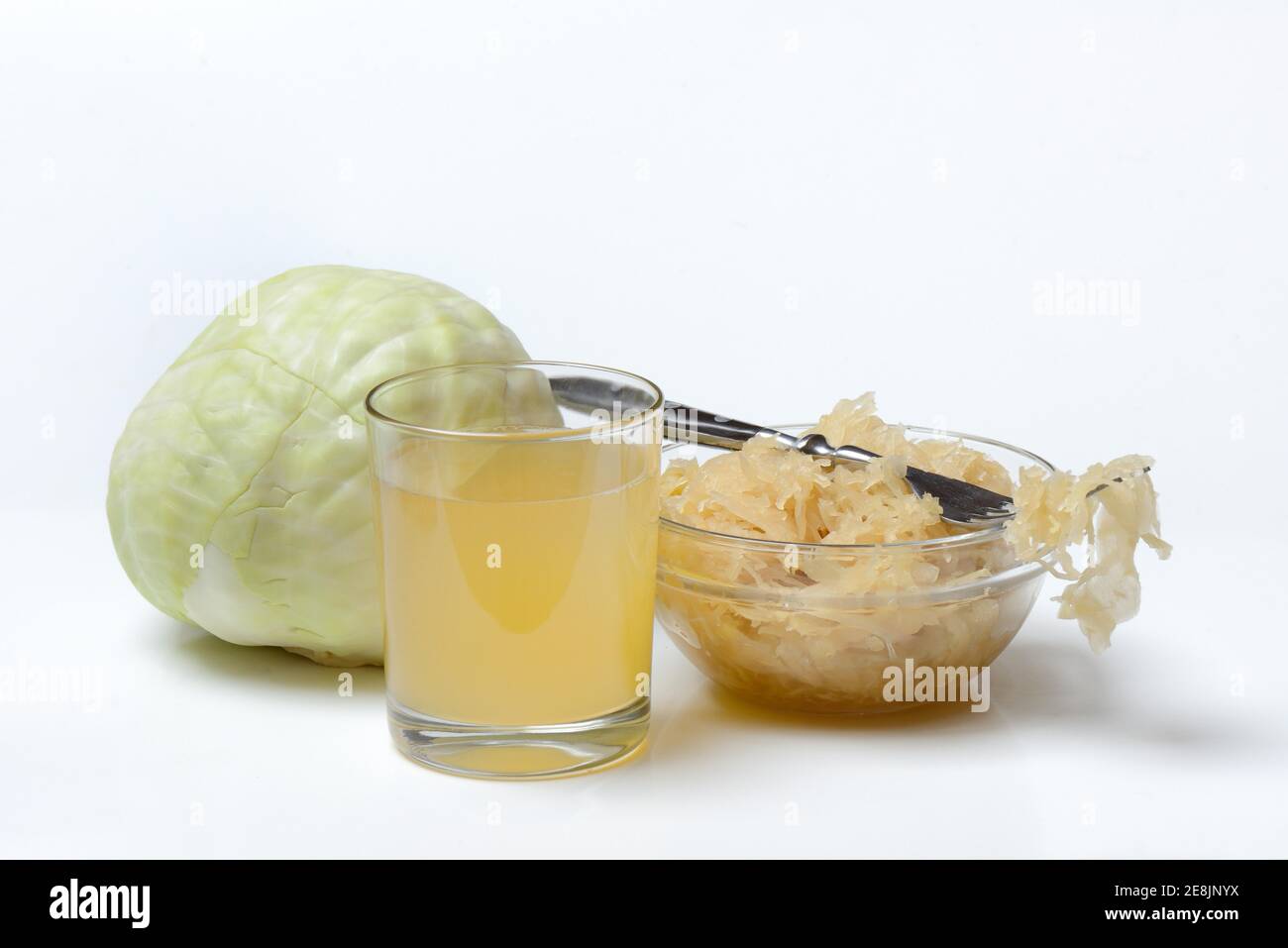 Sauerkraut and sauerkraut juice in glass, white cabbage Stock Photo Alamy