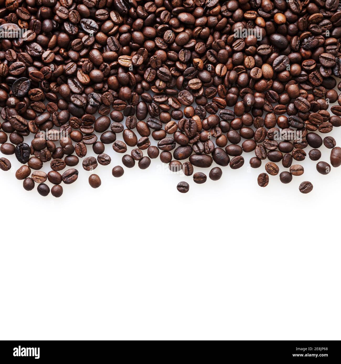 Roasted coffee beans on white background with copy space Stock Photo ...