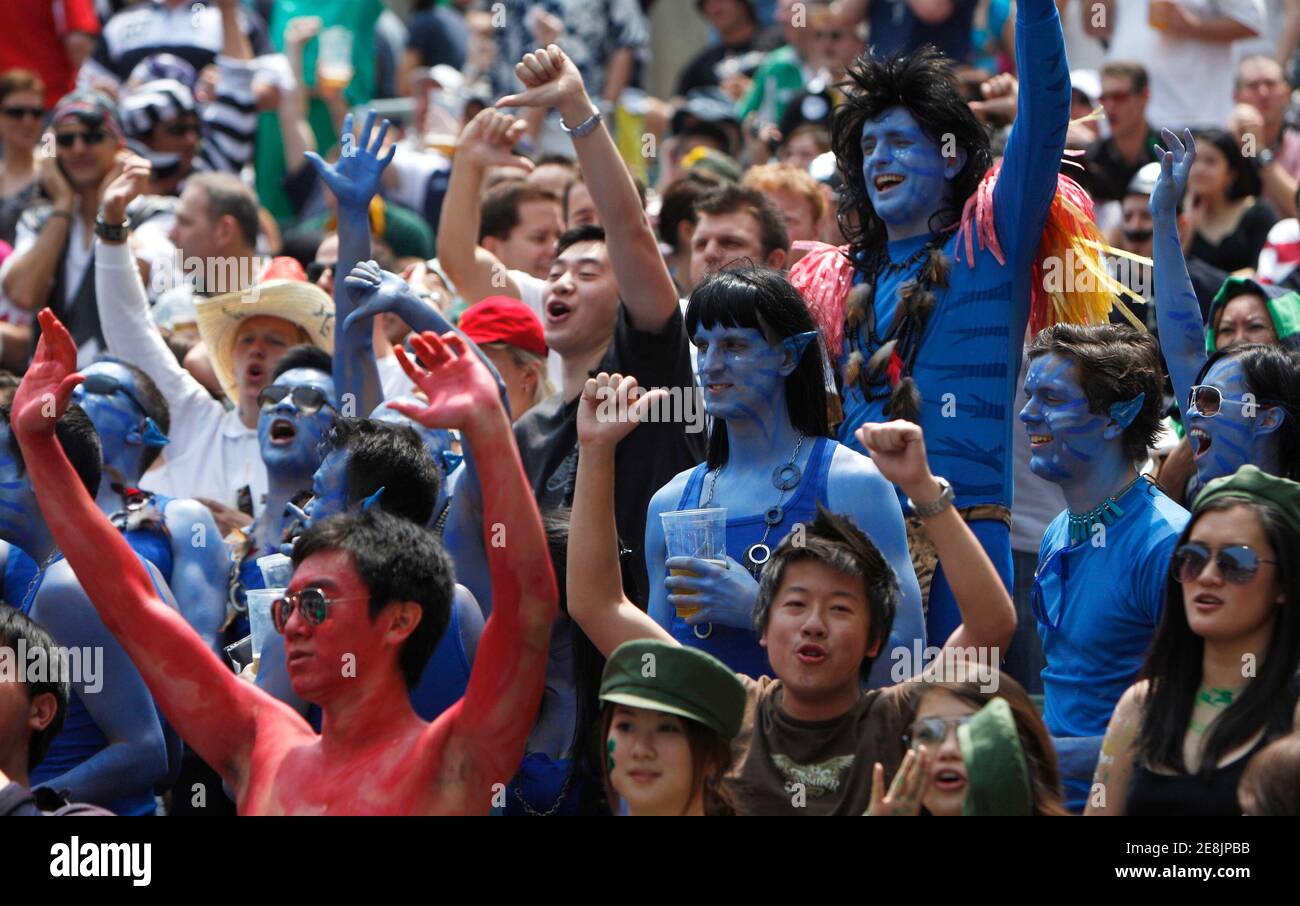 Rugby fans attend the preliminaries of the Hong Kong Sevens rugby tournament March 28, 2010. The annual three-day international sporting event attracts fans from around the world, creating a carnival atmosphere. REUTERS/Tyrone Siu  (CHINA - Tags: SPORT RUGBY) Stock Photo