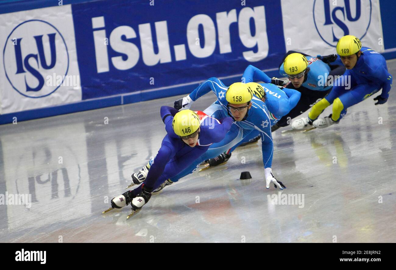Britain's Jack Whelbourne (146) leads skaters around a turn during the men's 1500 metres heats at the World Short Track Speed Skating Championships 2010 at Winter Sport hall in Sofia, March 19, 2010.    REUTERS/Oleg Popov   (BULGARIA) Stock Photo