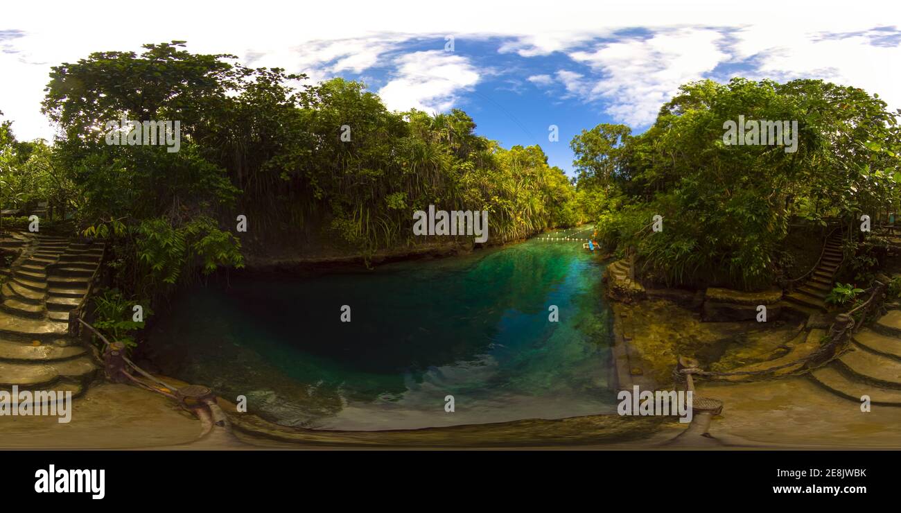 Canyon with a blue lagoon. Enchanted River in Hinatuan, Surigao Del Sur, Philippines. 360 panorama VR. Stock Photo