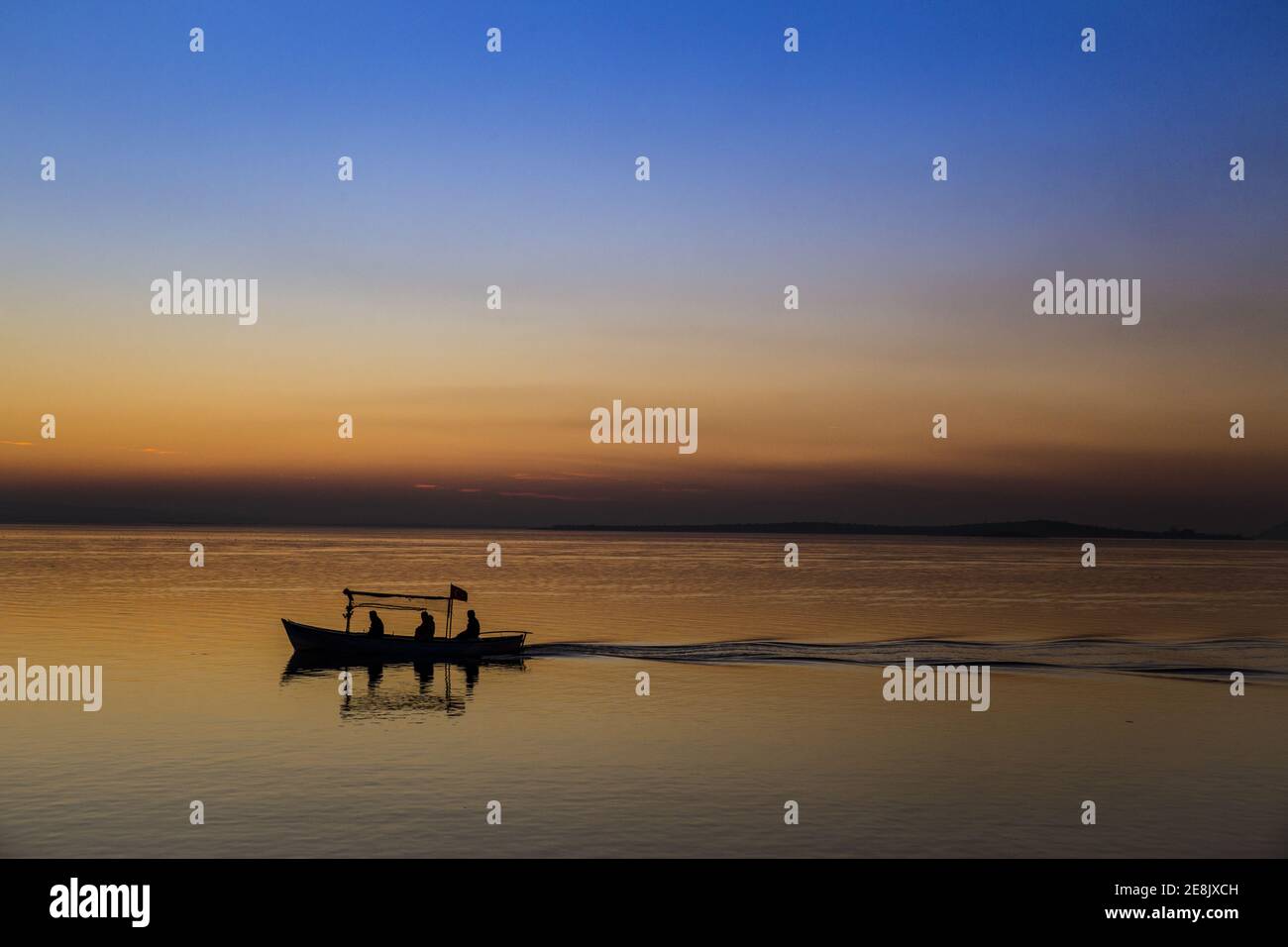 Silhouette fishing boat fishermen hi-res stock photography and images ...