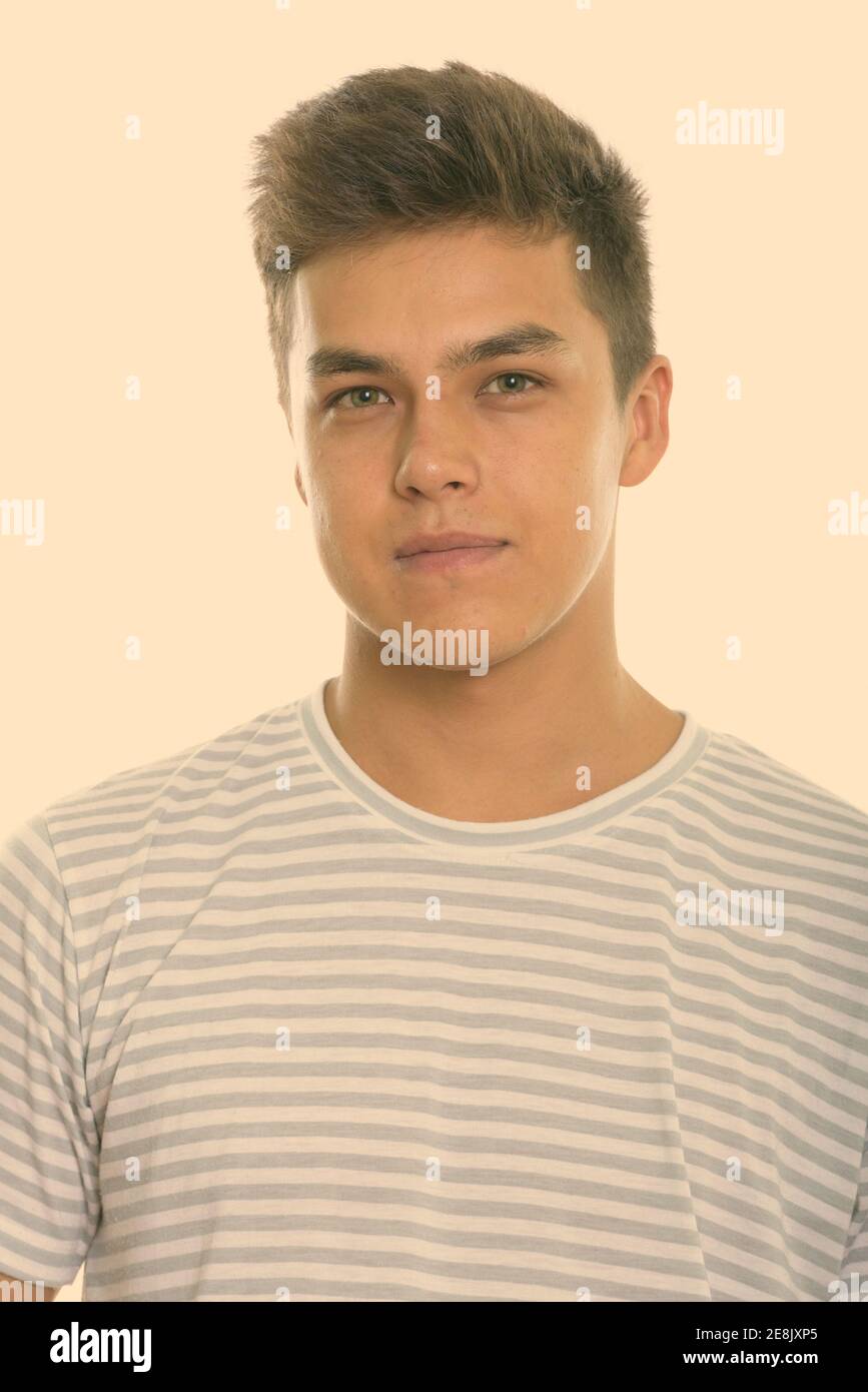 Studio shot of young handsome man Stock Photo - Alamy