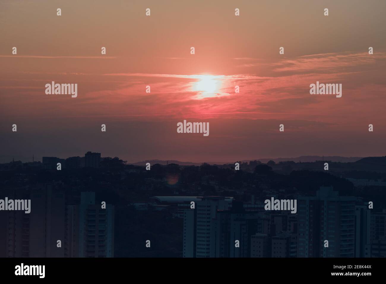 Sunset skyline city background Stock Photo - Alamy