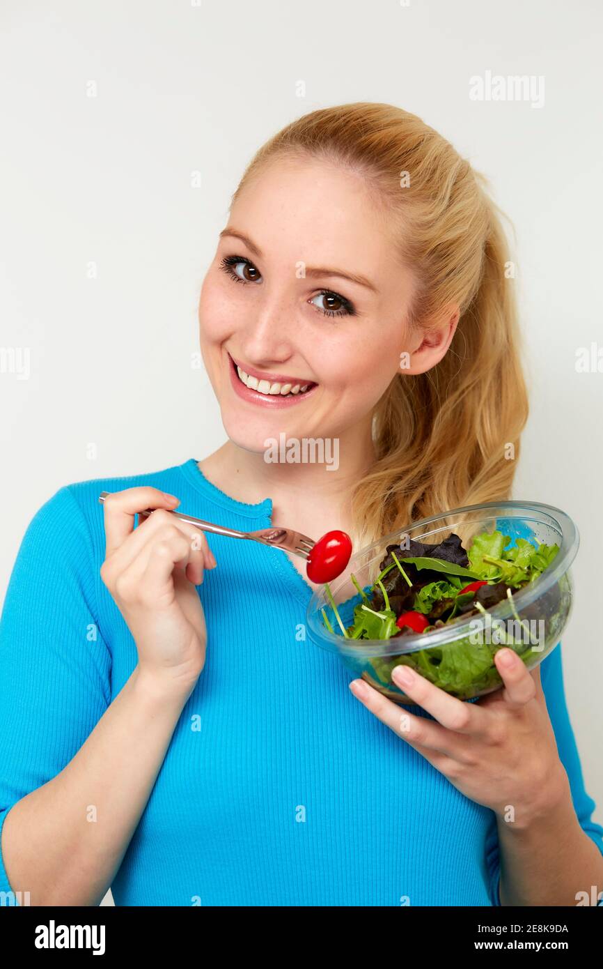 Woman holding salad Stock Photo