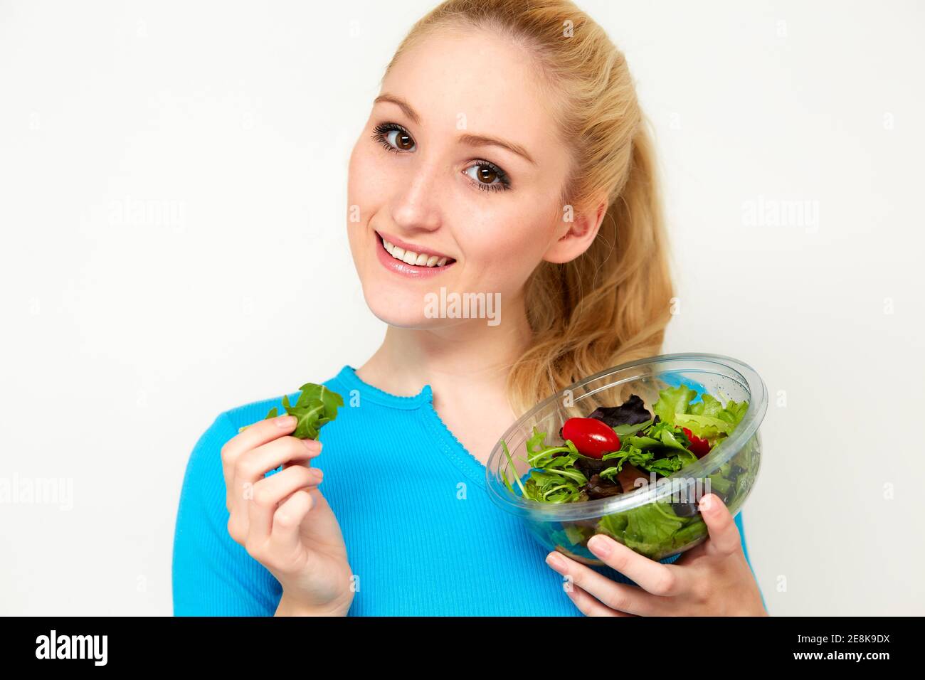 Woman holding salad Stock Photo