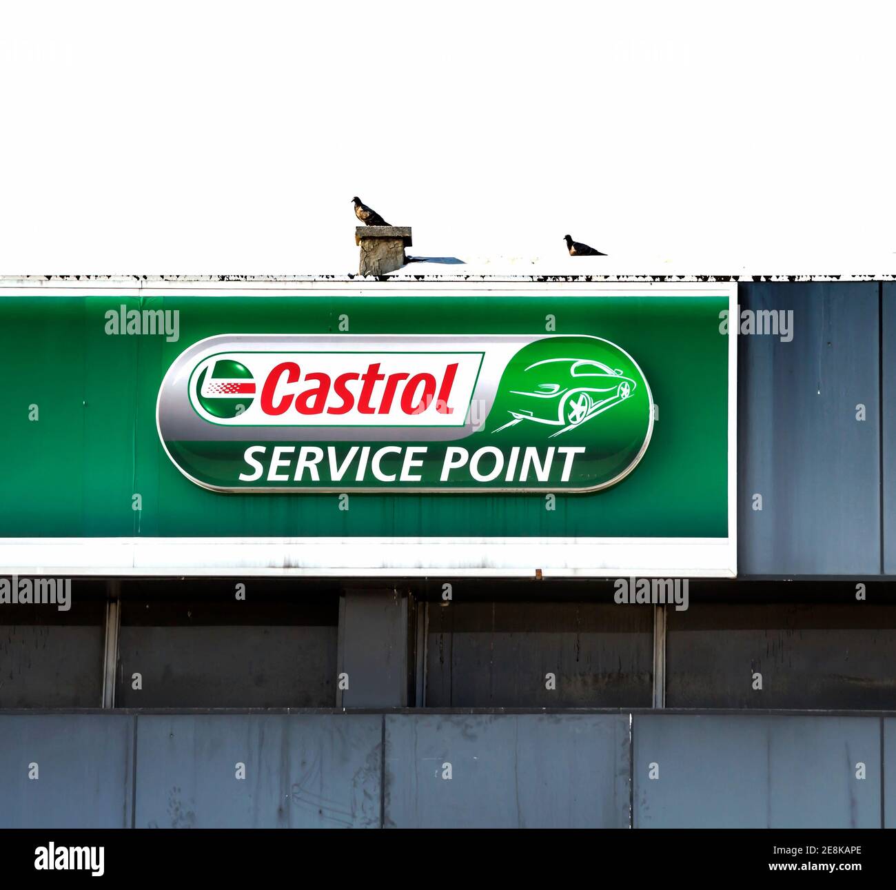 Castrol service point. Castrol is a British global brand of industrial and automotive lubricants offering a wide range of oils and greases Stock Photo