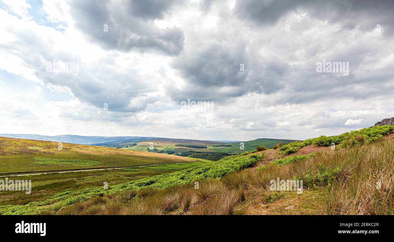 rolling landscape ith moody clouds over Stanage Edge, Derbyshire, UK Stock Photo