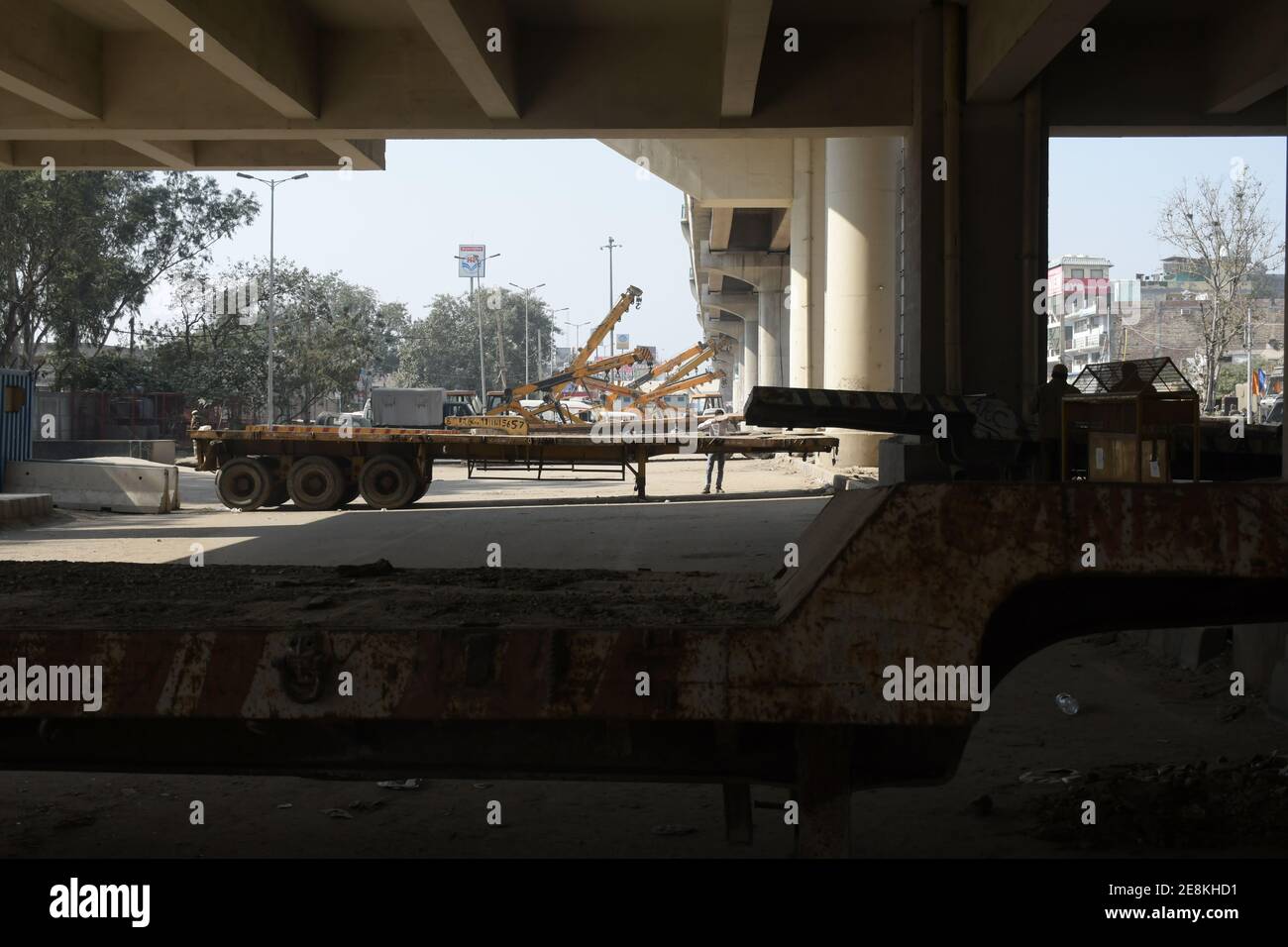 New Delhi, India. 31st Jan, 2021. JCB and trollies standing at Tikri Border for security reasons during the ongoing protest for the last 2 months against new agriculture law introduce by Central Government of India at Tikri Border in Delhi. (Photo by Ishant Chauhan/Pacific Press) Credit: Pacific Press Media Production Corp./Alamy Live News Stock Photo
