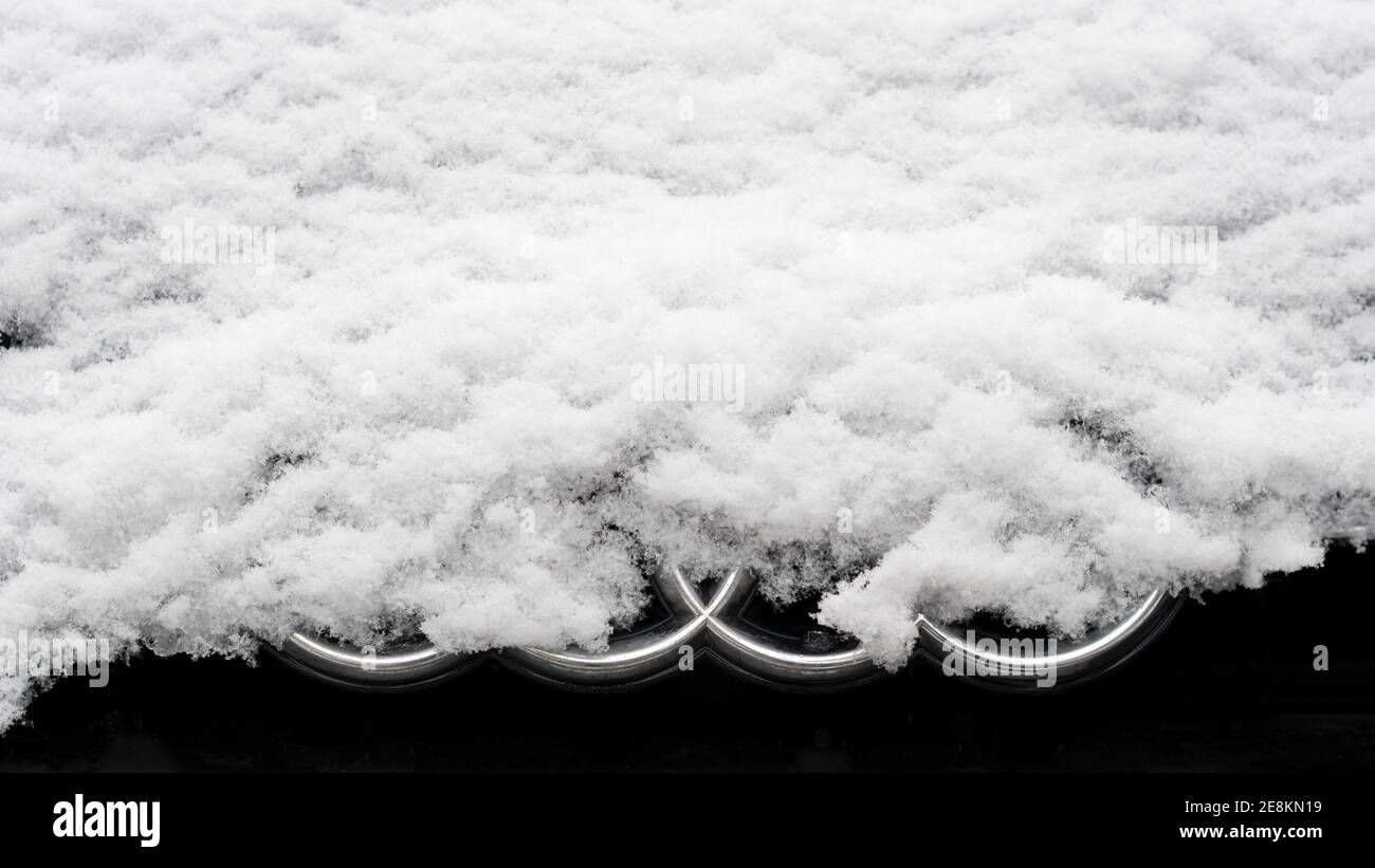BERLIN, GERMANY - JANUARY 30, 2021: Close-up of A Snow-capped Audi Logo On A Car In Berlin, Germany Stock Photo