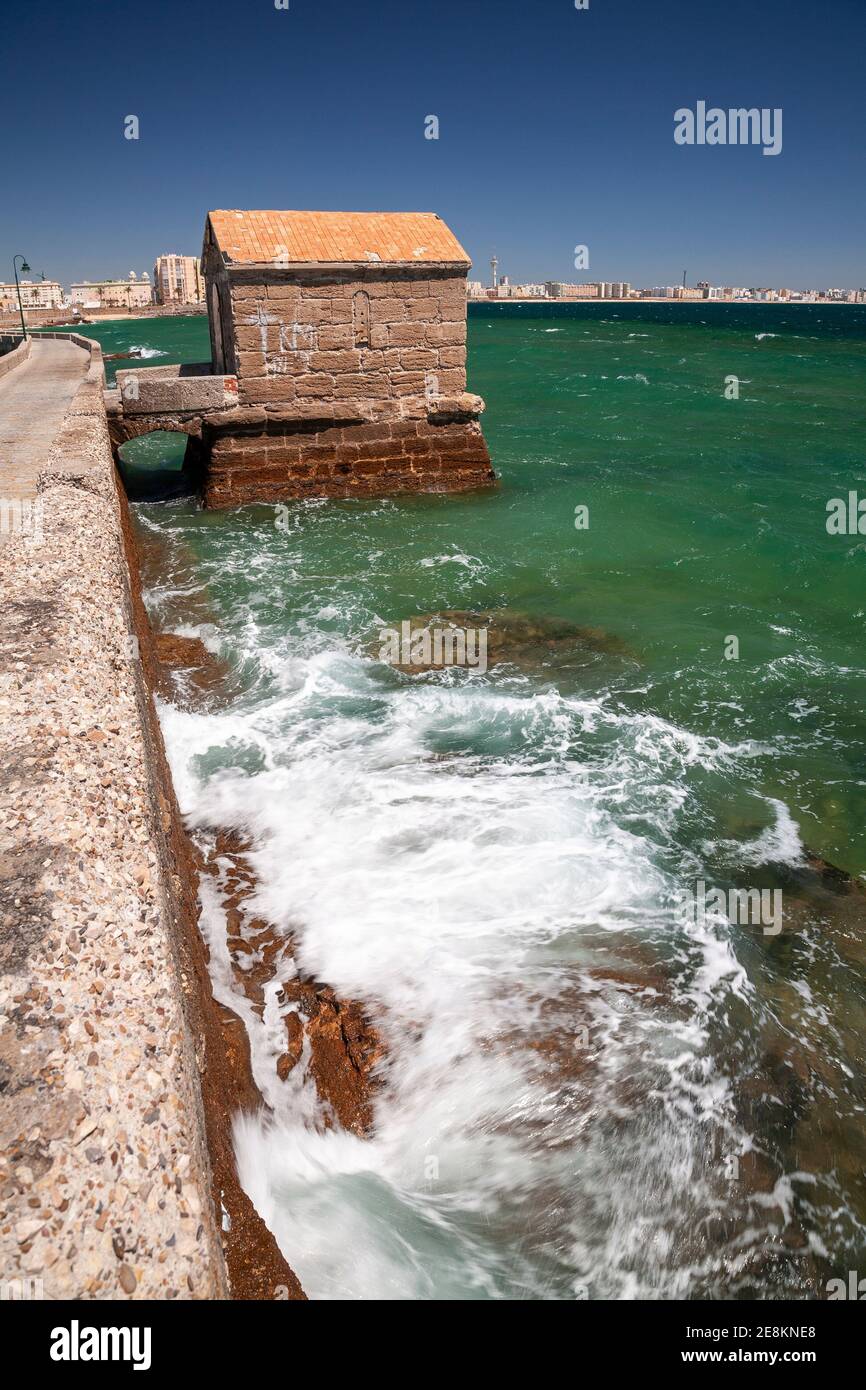 Breakwater and stone hut, Cadiz, Spain Stock Photo