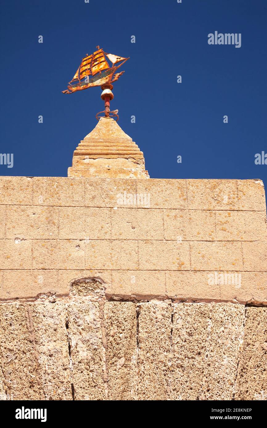 Rusty ship weatherwane, Cadiz, Spain Stock Photo