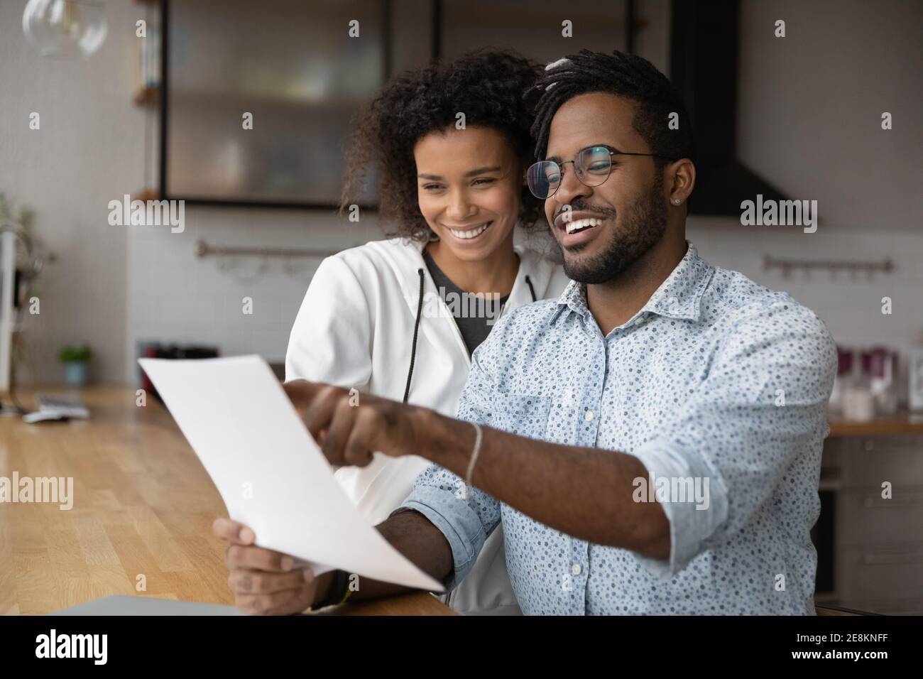 Black woman reading letter hi-res stock photography and images - Alamy