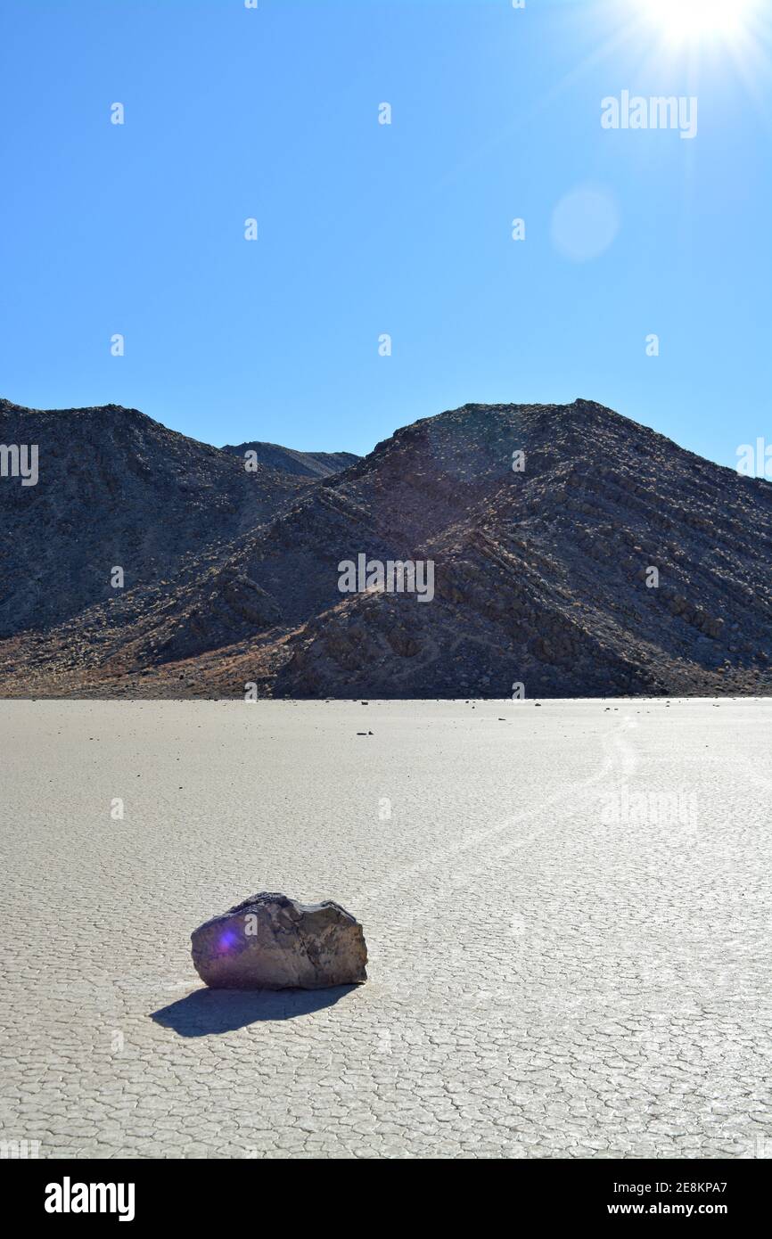 sailing rock leaving a long trail in the desert of the Racetrack Playa ...