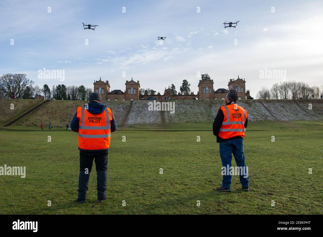 Hamilton, Scotland, UK. 31st Jan, 2021. Pictured: Professional drone pilots flying their drones seen in Chatelherault Country Park as others take in exercise as the temperature stays just above freezing. The sun is out and people are enjoying themselves during the coronavirus phase 4 lockdown. Credit: Colin Fisher/Alamy Live News Stock Photo