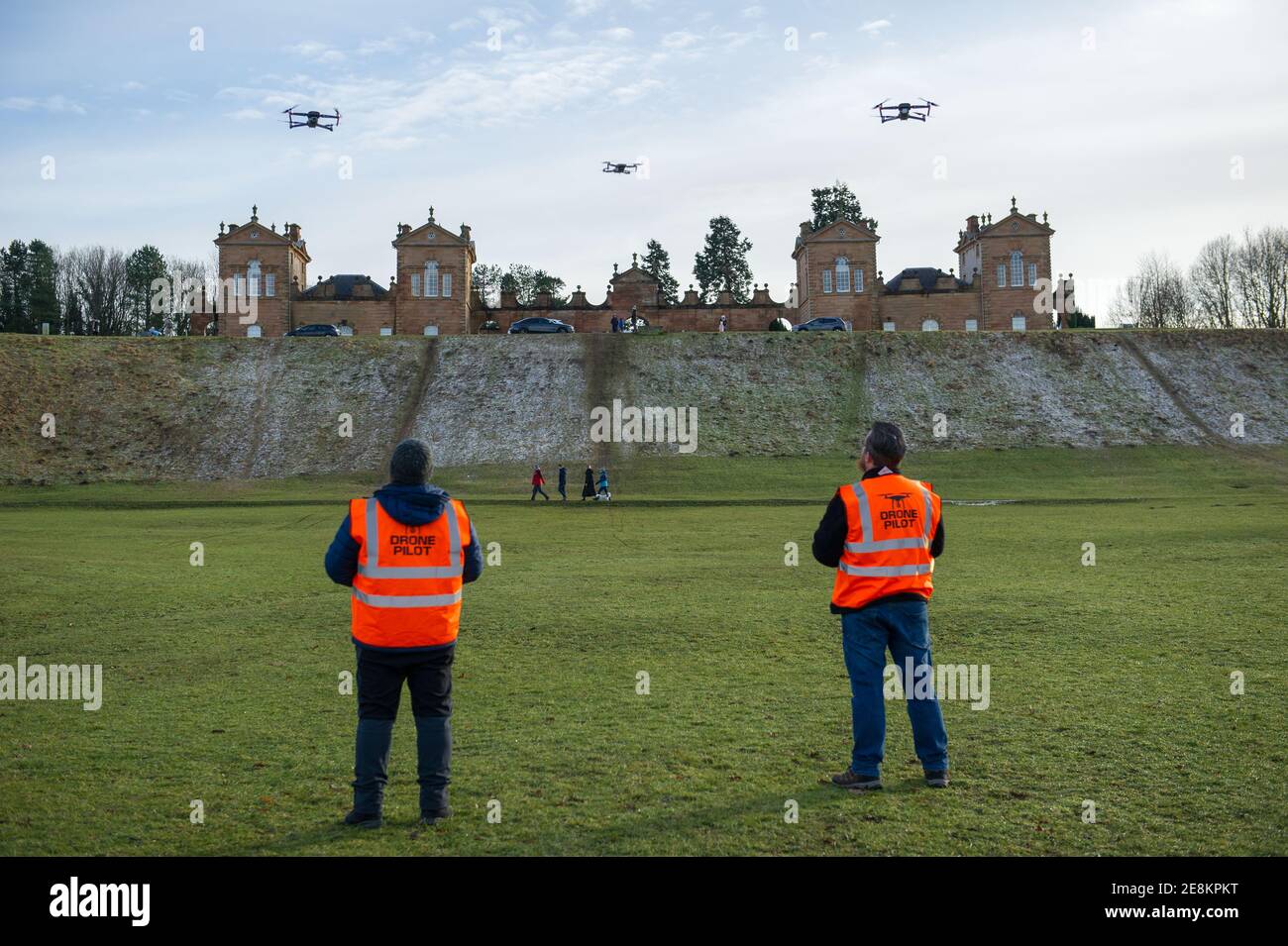 Hamilton, Scotland, UK. 31st Jan, 2021. Pictured: Professional drone pilots flying their drones seen in Chatelherault Country Park as others take in exercise as the temperature stays just above freezing. The sun is out and people are enjoying themselves during the coronavirus phase 4 lockdown. Credit: Colin Fisher/Alamy Live News Stock Photo