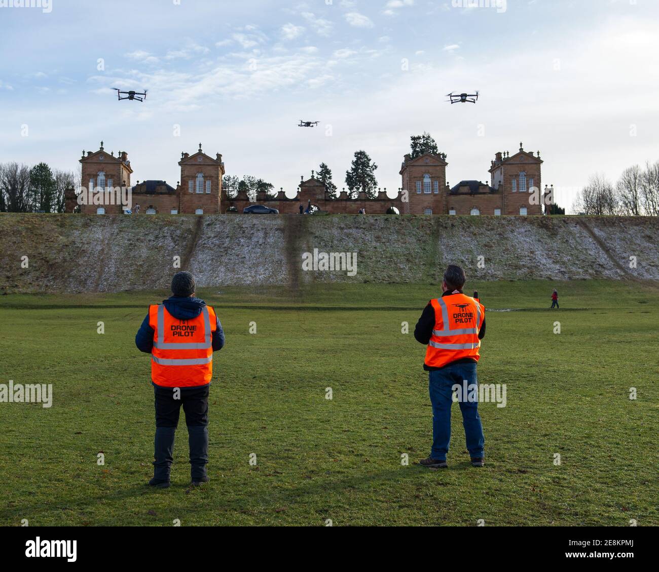 Hamilton, Scotland, UK. 31st Jan, 2021. Pictured: Professional drone pilots flying their drones seen in Chatelherault Country Park as others take in exercise as the temperature stays just above freezing. The sun is out and people are enjoying themselves during the coronavirus phase 4 lockdown. Credit: Colin Fisher/Alamy Live News Stock Photo