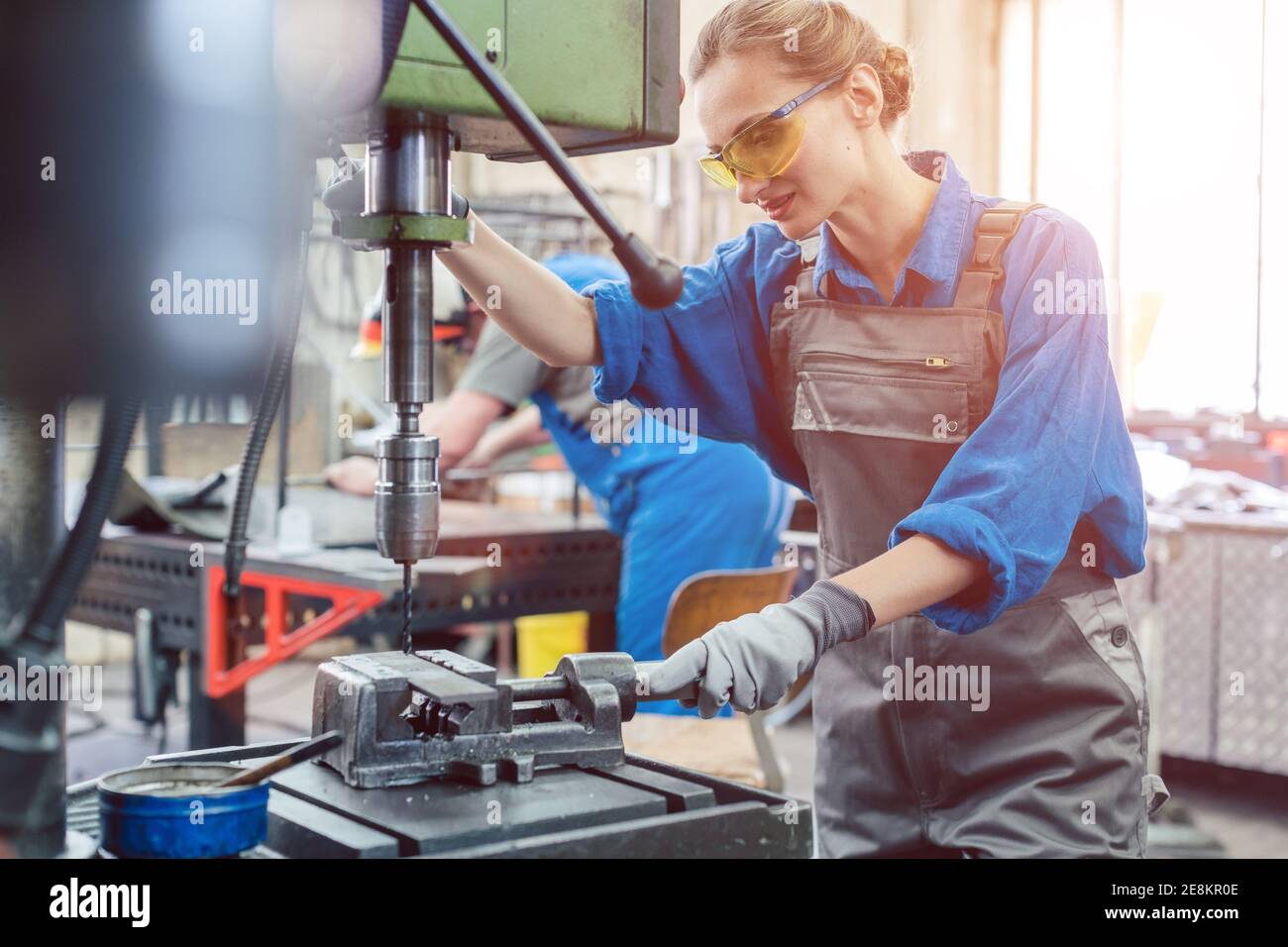 Woman operating drill press hi-res stock photography and images - Alamy