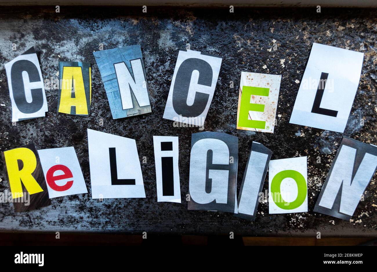 The Phrase 'Cancel Religion' using cut-out paper letters in the ransom note effect typography, USA Stock Photo