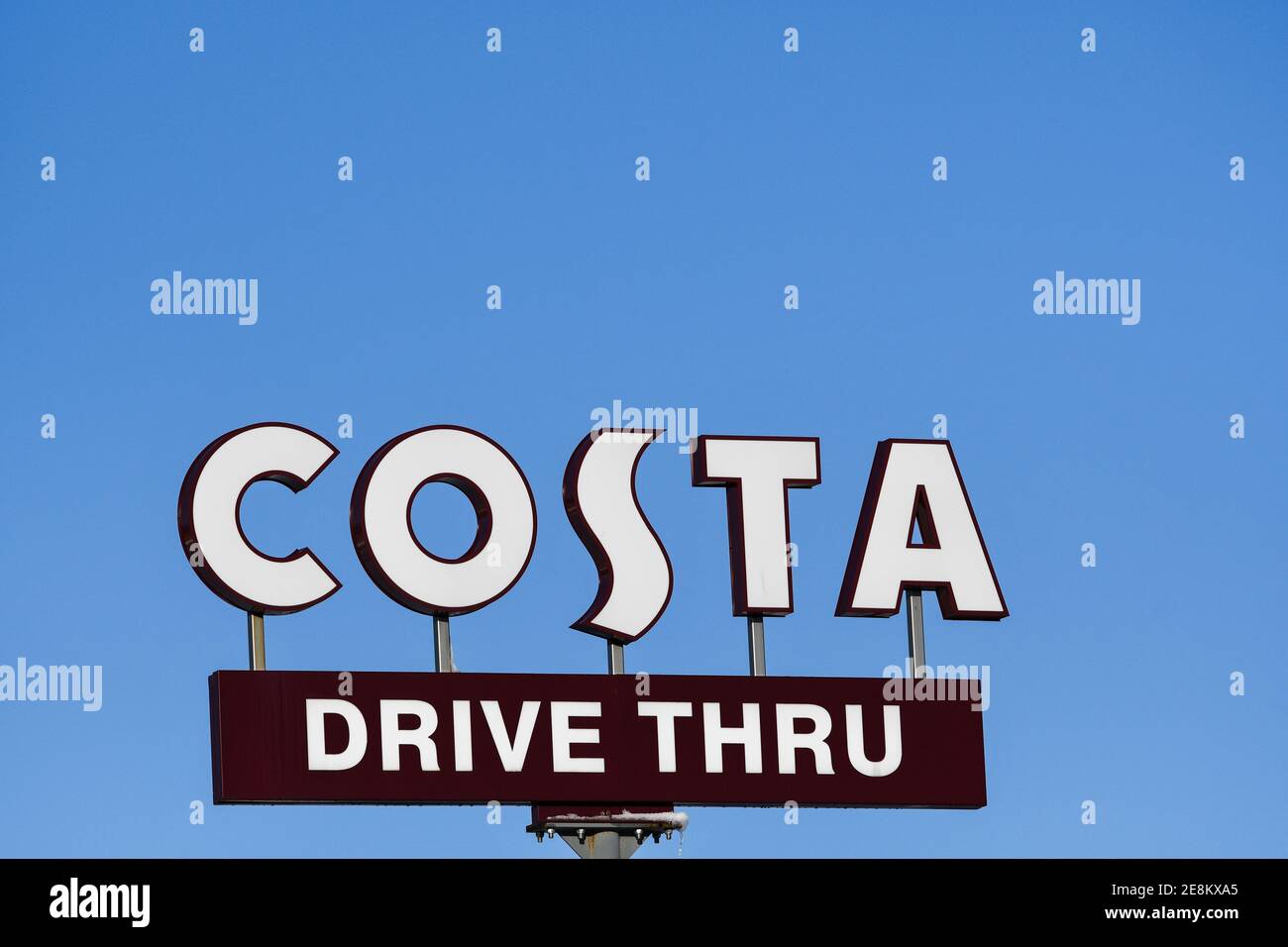 costa coffee sign against a blue sky Stock Photo