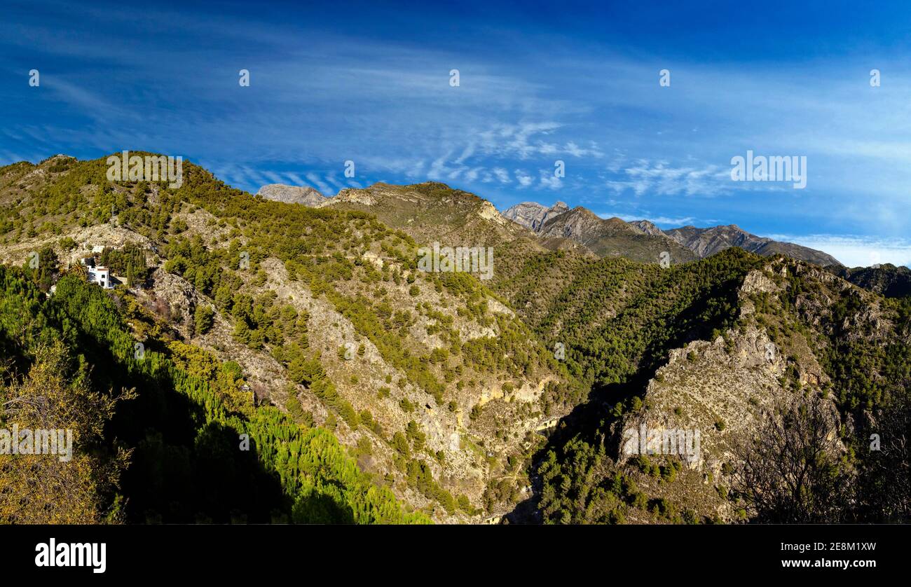 The Chillar Valley in the Sierra de Tejeda, a mountain range rising above  behind Frigiliana in the province of Malaga, Andalusia, Spain. Stock Photo