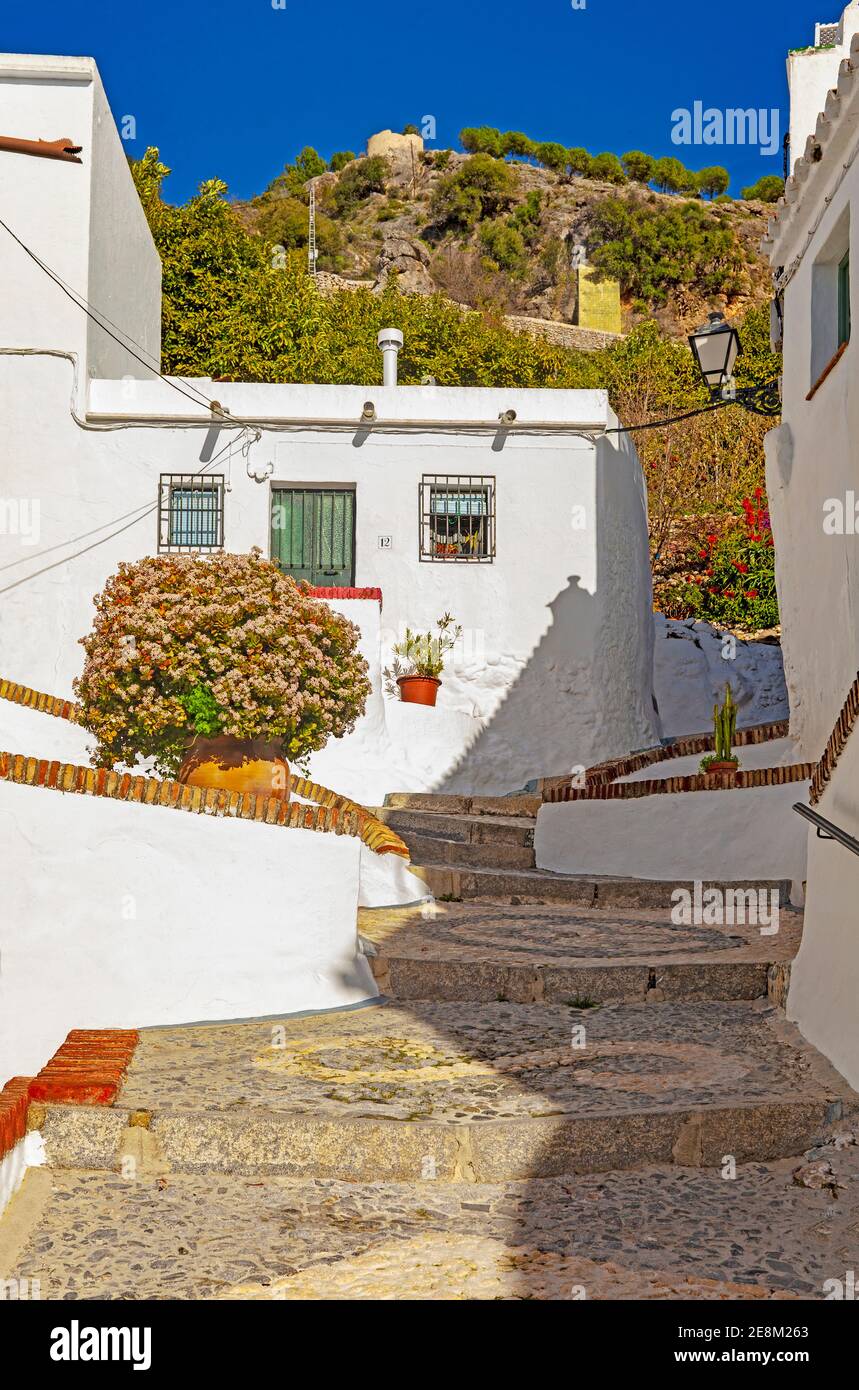 Cobbled mosaic steps in a Frigiliana street, Costa del Sol, Malaga Province, Andalucia, Spain Stock Photo