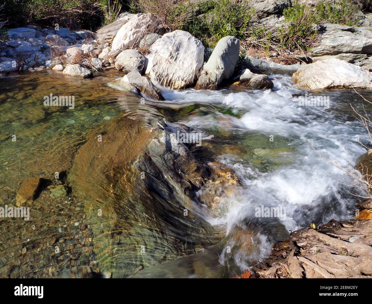 Gurgling stream rushing down a remote gorge in Euboea island, Greece Stock  Photo - Alamy