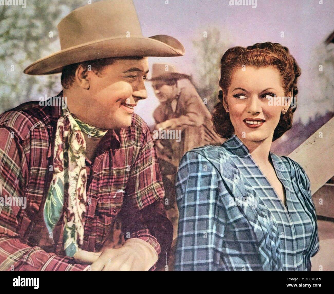 UNDER COLARADO SKIES 1947 Republic Pictures film with Monte Hale at left and Adrian Booth (aka Lorna Gray) Stock Photo