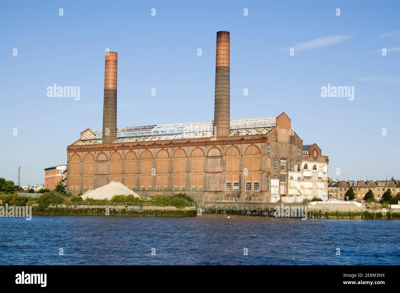 View across the River Thames towards the disused Lots Road Power Station in Chelsea. It used to provide energy for the London Underground. Stock Photo