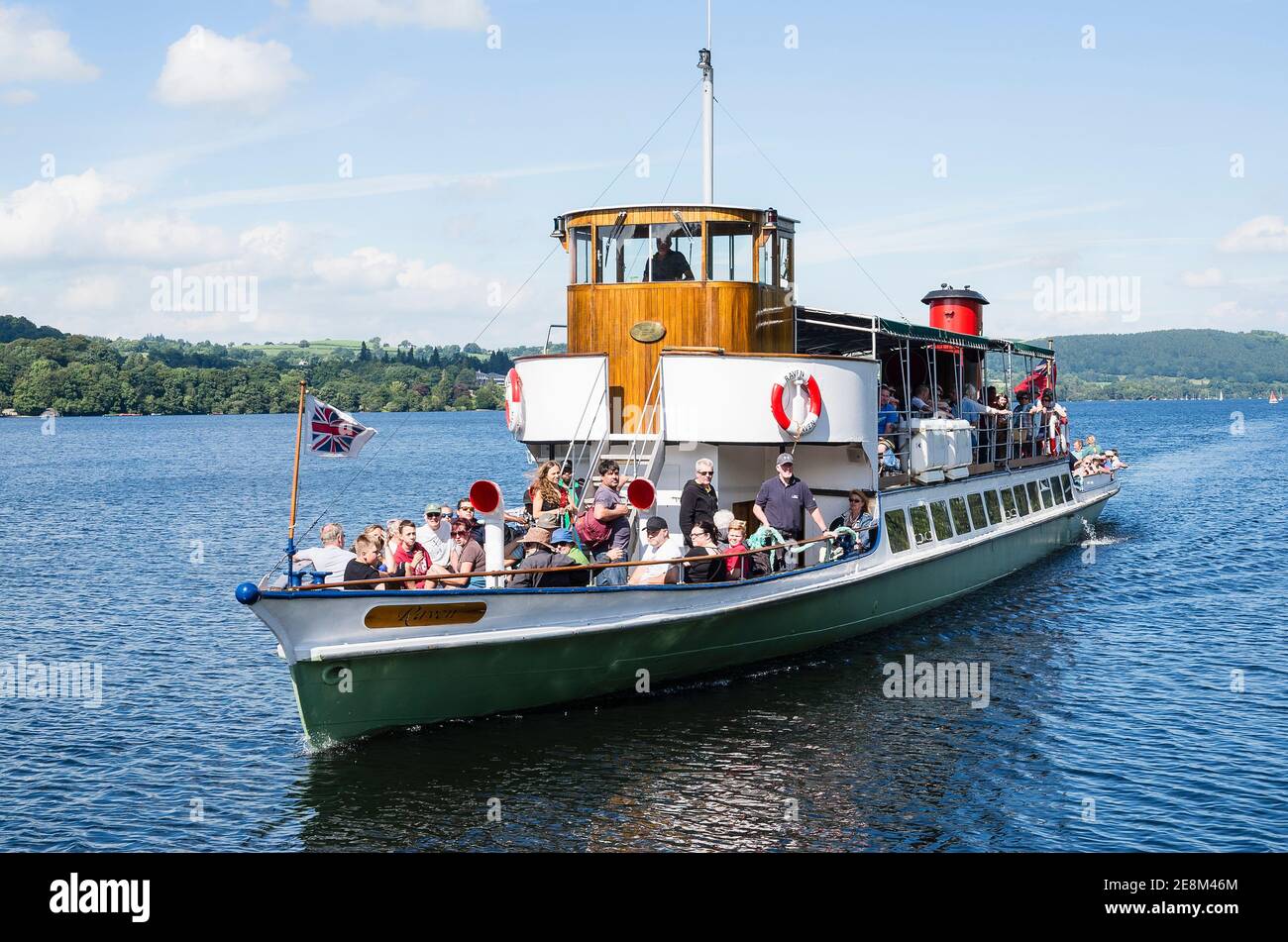 A passenger ferry boat on Lake Windermere carrying tourists on aa cruise or to other places for disembarkation in Cumbria UK Stock Photo