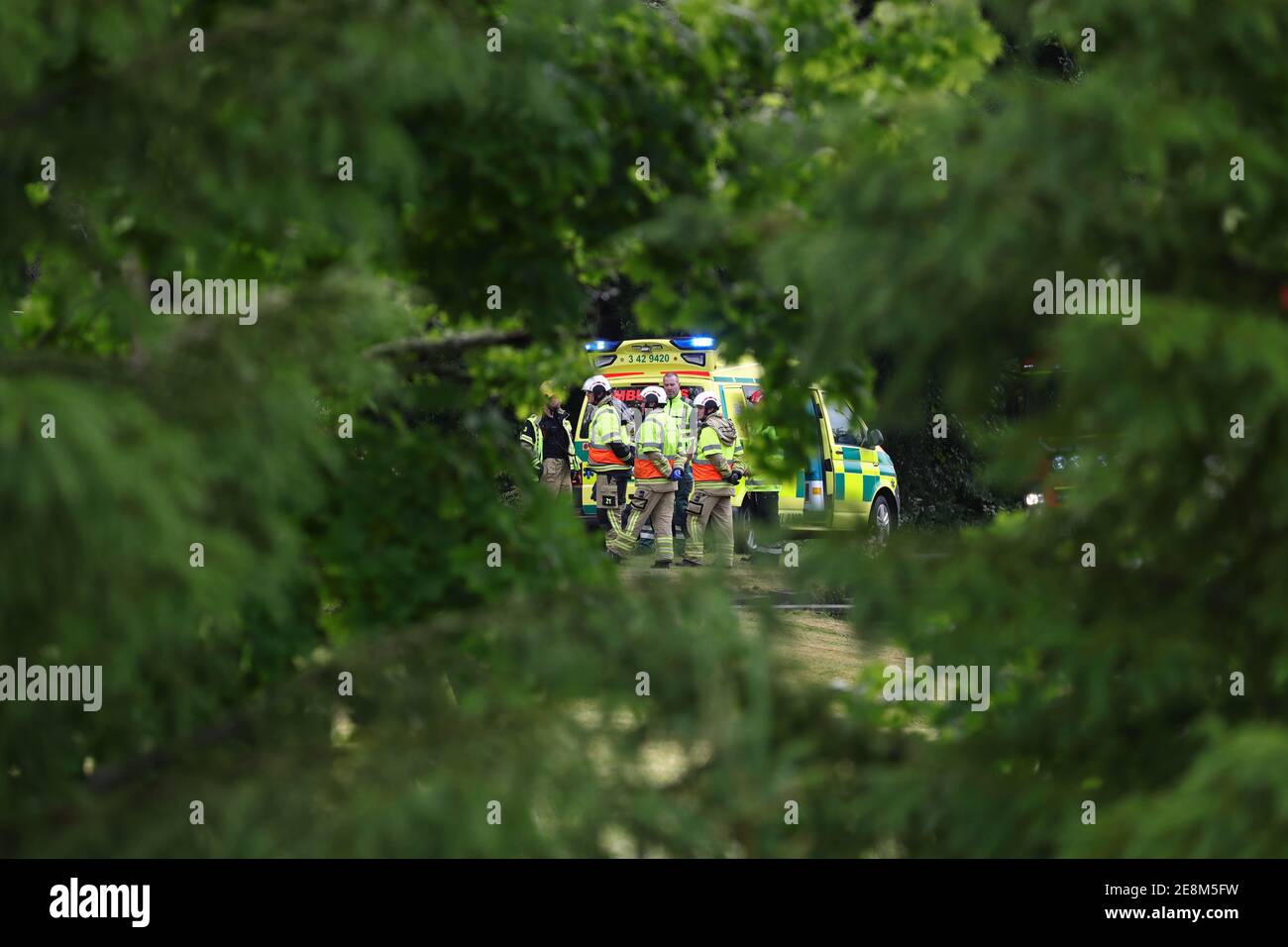 MOTALA, SWEDEN- 22 JUNE 2020:SOS alerted police, emergency services and ambulance to Djurgårdsvägen just outside Motala. A passenger car had driven off the road. Four people must have been in the car. Stock Photo