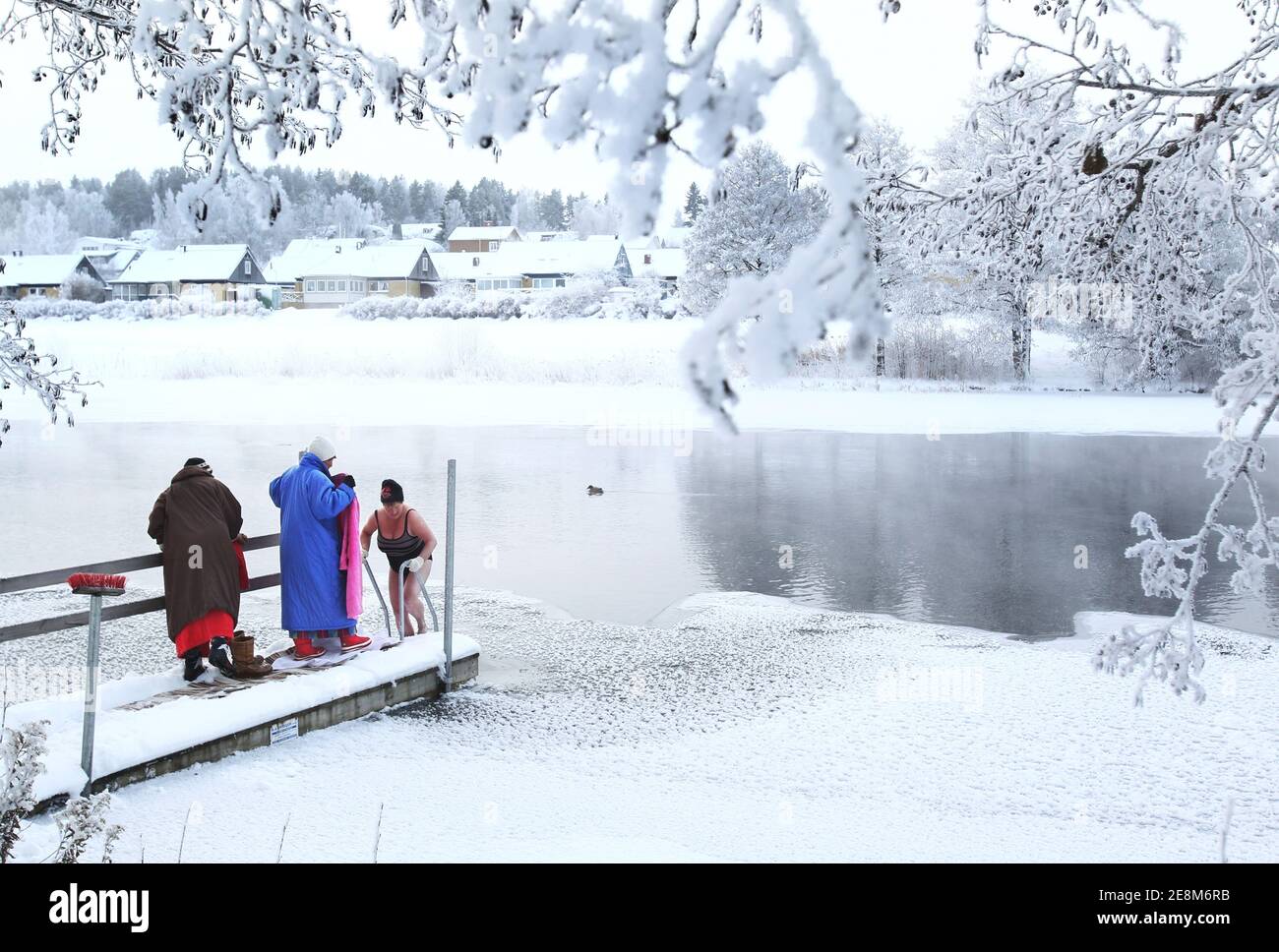 LINKÖPING, SWEDEN- 1 DECEMBER 2010: Winter bathing ladies in winter ...