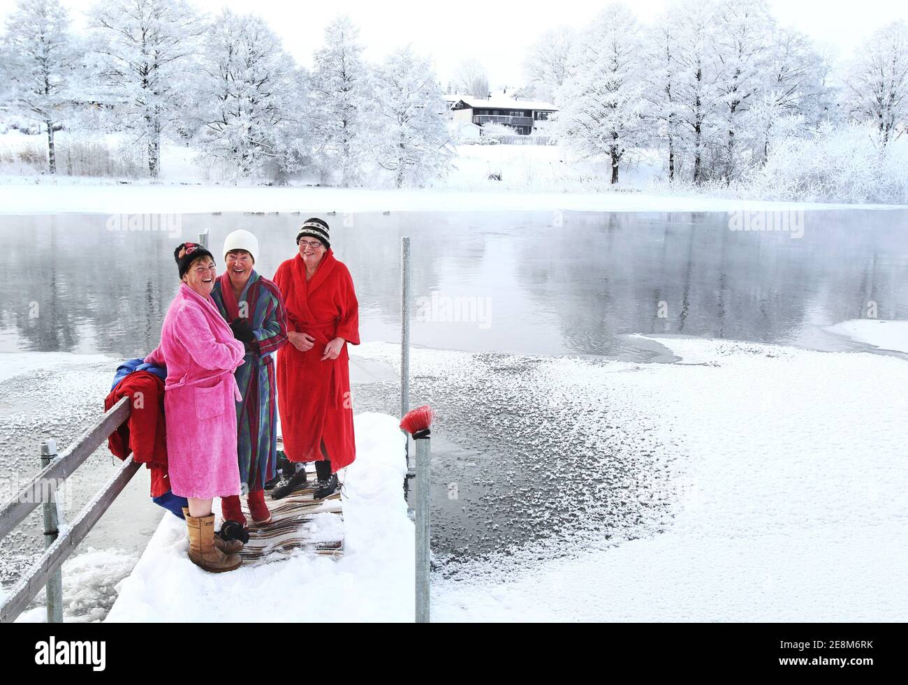 LINKÖPING, SWEDEN- 1 DECEMBER 2010: Winter bathing ladies in winter ...