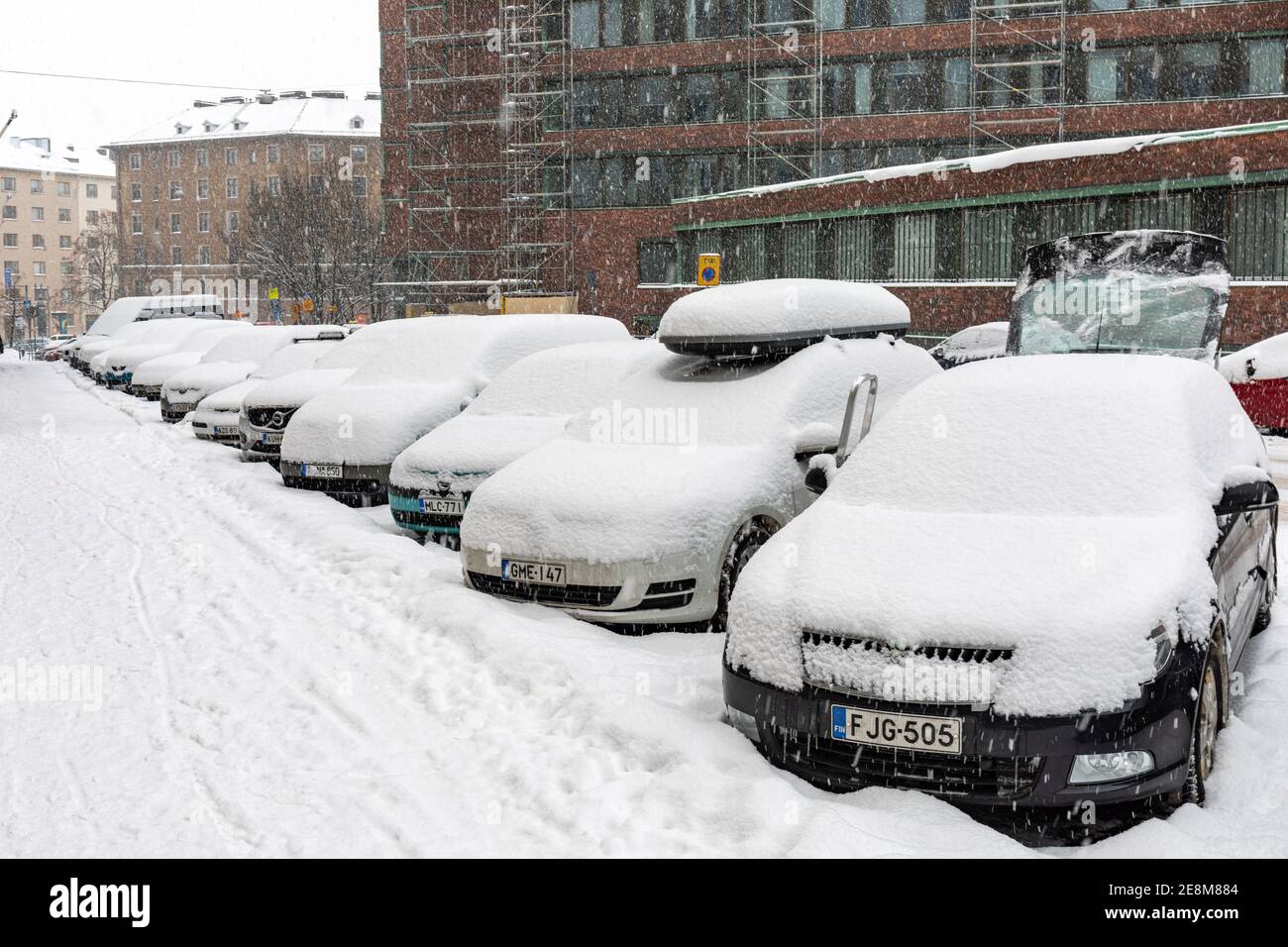 Cars covered in snow finland hi-res stock photography and images