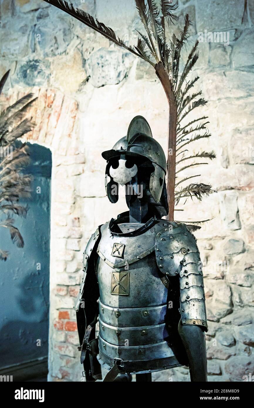 Gallery of knight's armor. Knight's iron armor in the museum. toned