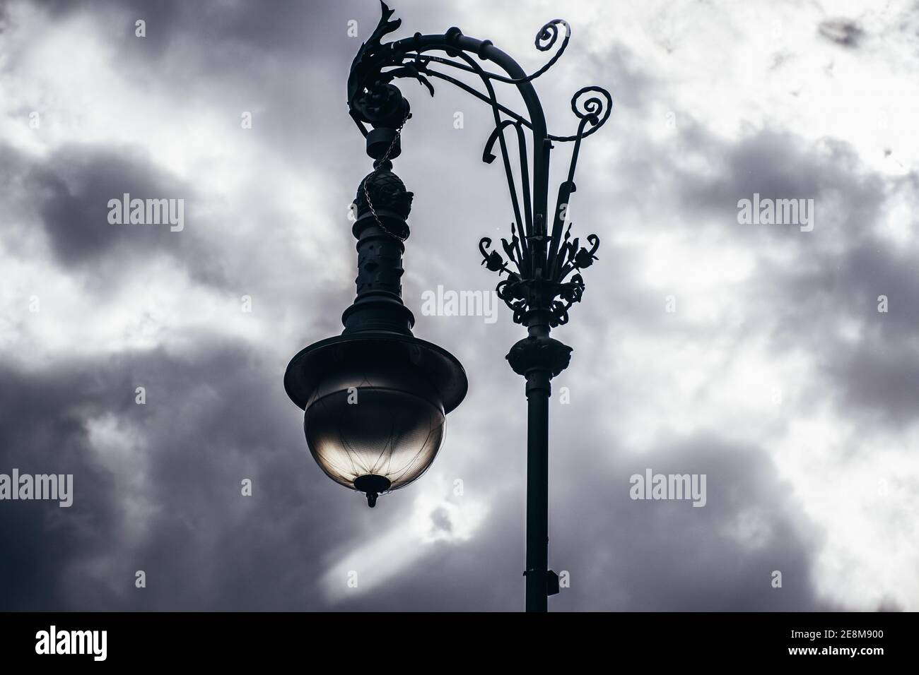 Elegant Victorian street lantern of cast iron, Berlin central street Stock Photo