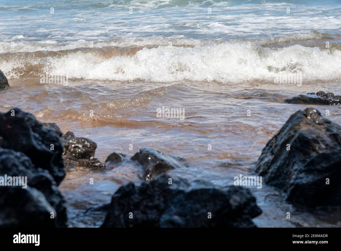 Waves on a Rocky Beach Stock Photo