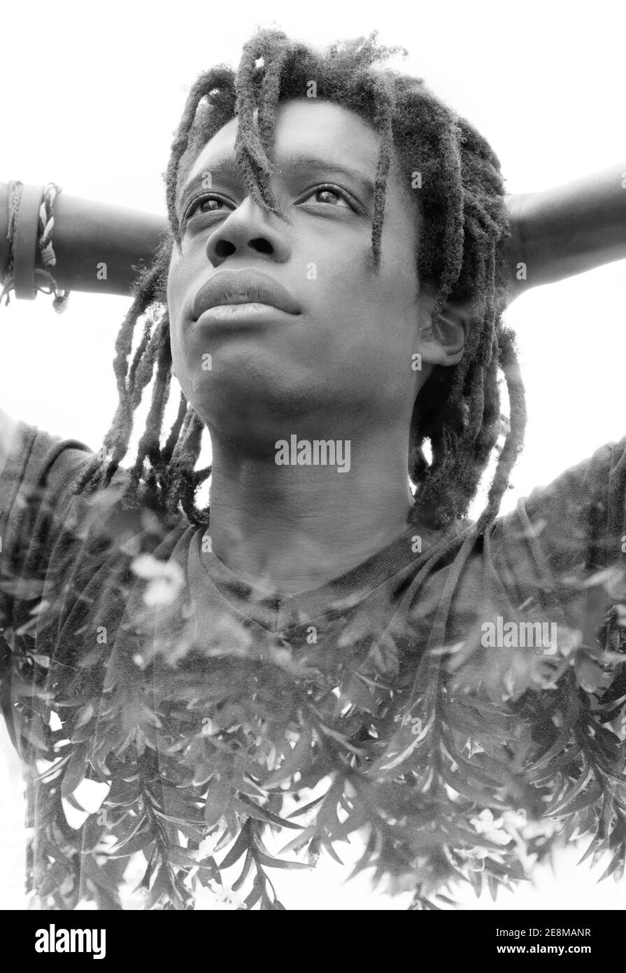 A gazing man black and white double exposure portrait Stock Photo - Alamy